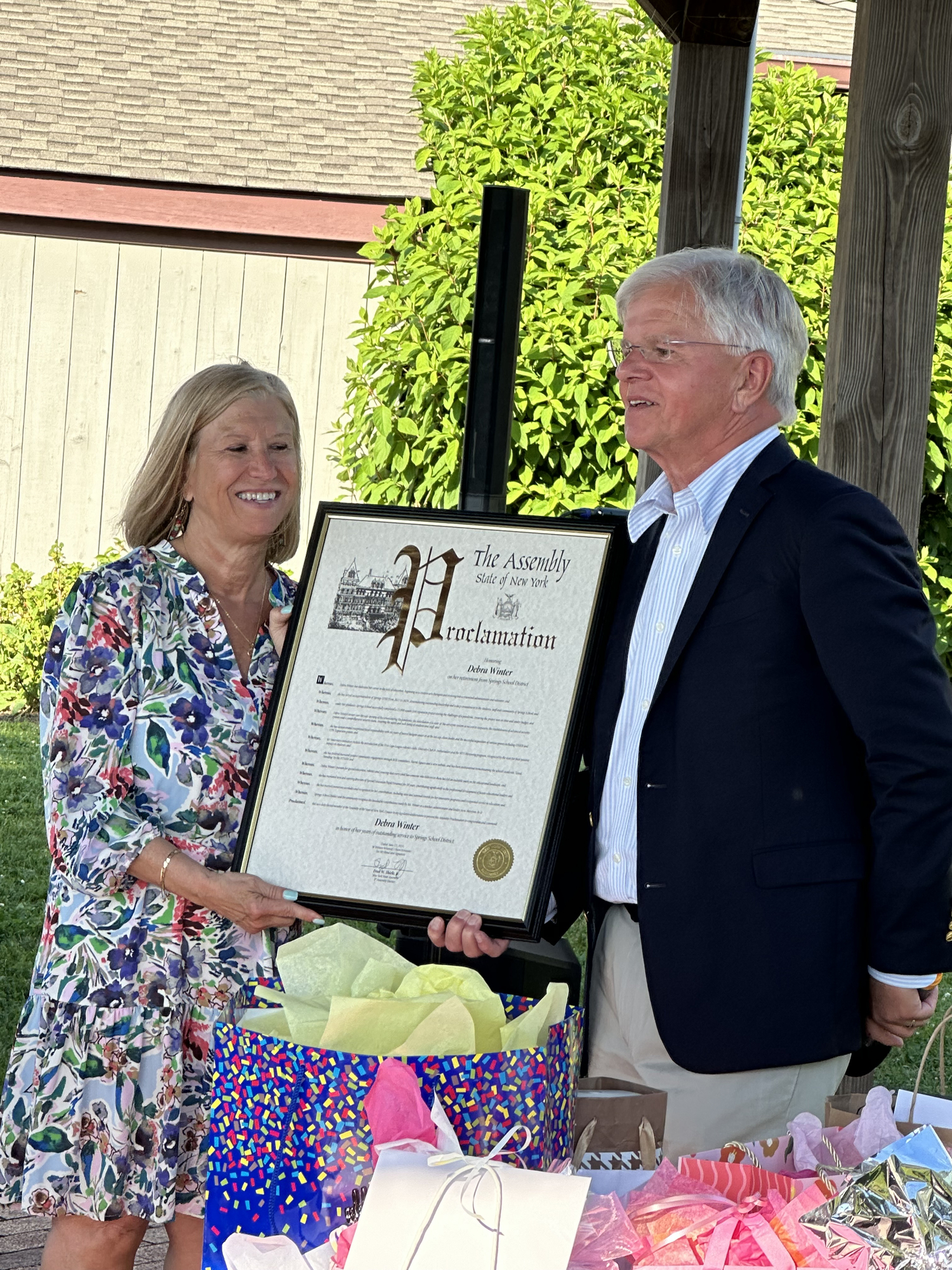 New York State Assemblyman Fred W. Thiele Jr. honored Springs School Superintendent Debra Winter with a proclamation recently for her service. Winter is retiring as superintendent of the Springs School District.