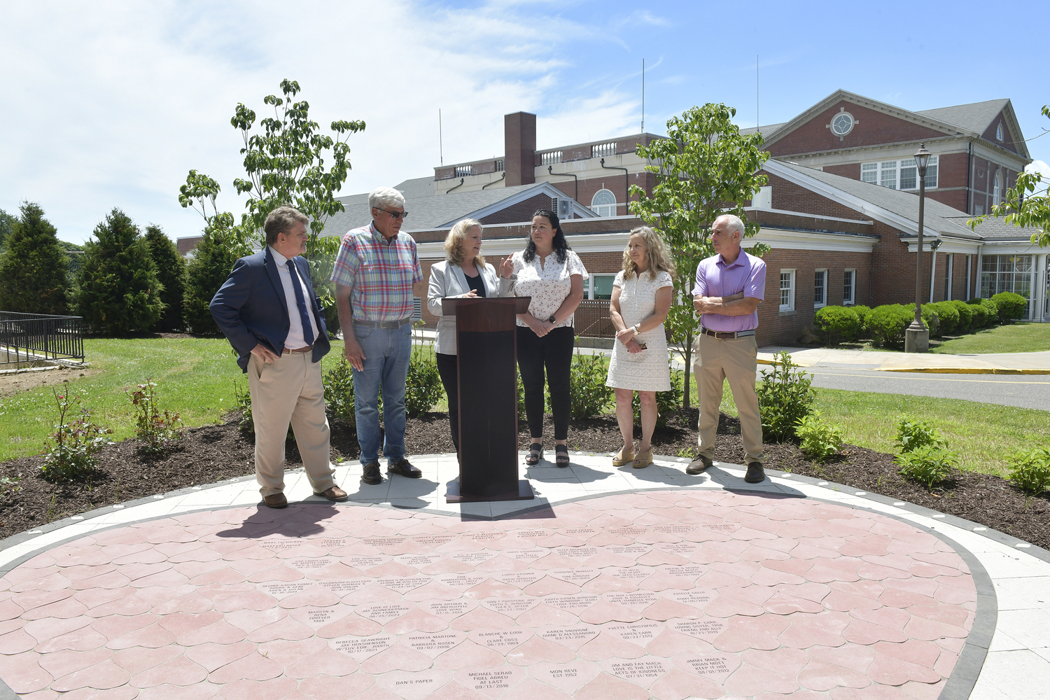 Southampton Town Board members Tommy John Schiavoni, Bill Pell, Supervisor Maria Moore, town board member Cyndi McNamara, town clerk  Sundy Schermeyer and former town supervisor Jay Schneiderman gathered to celebrate the one year anniversary of the Edith Windsor Memorial Park at Southampton Town Hall on June 27.  DANA SHAW