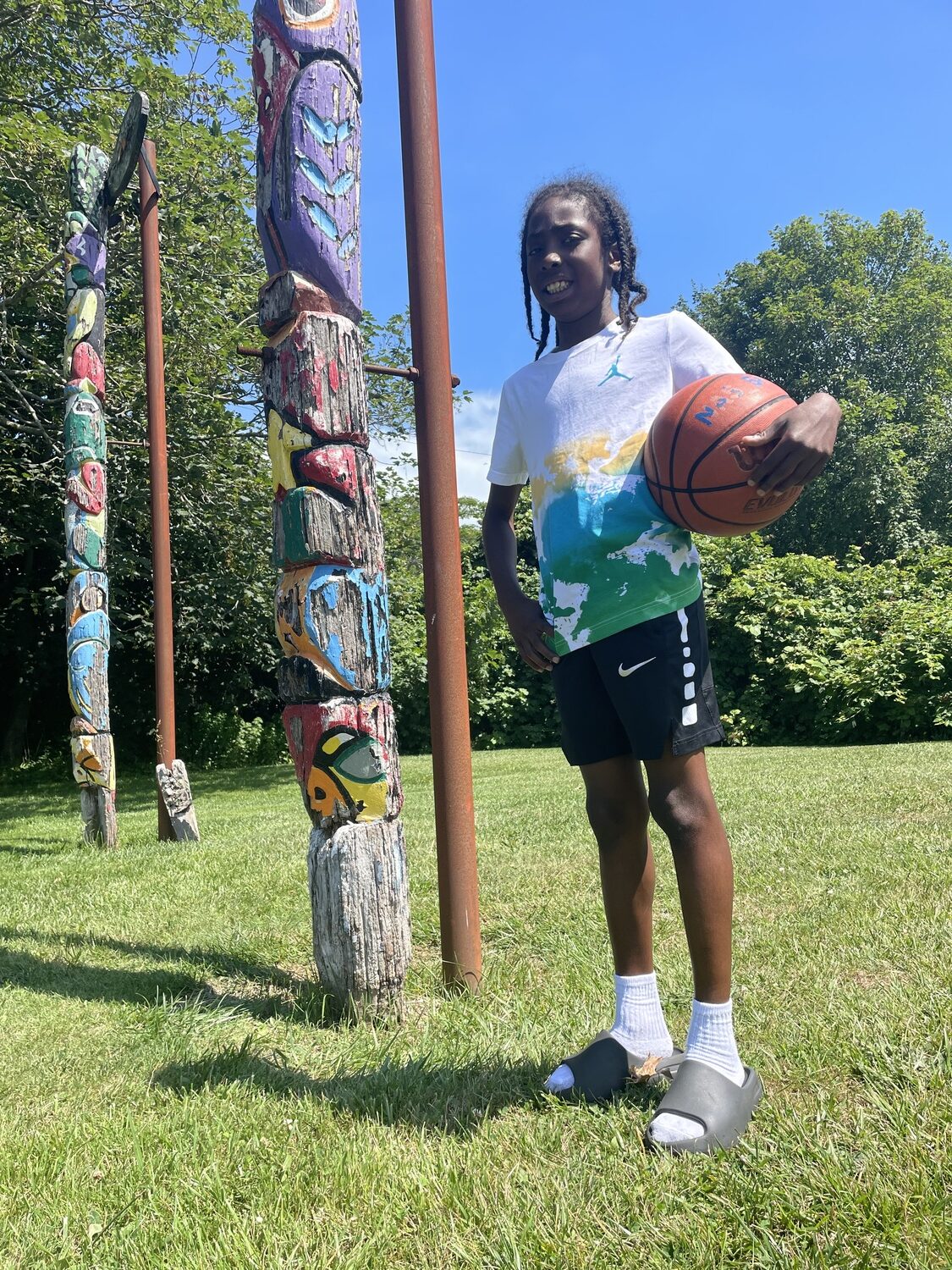Nas McCoy, 10, is a young basketball star, and plays for the Bronx-based Gauchos, an AAU team that counts Stephon Marbury as one of its alums. CAILIN RILEY
