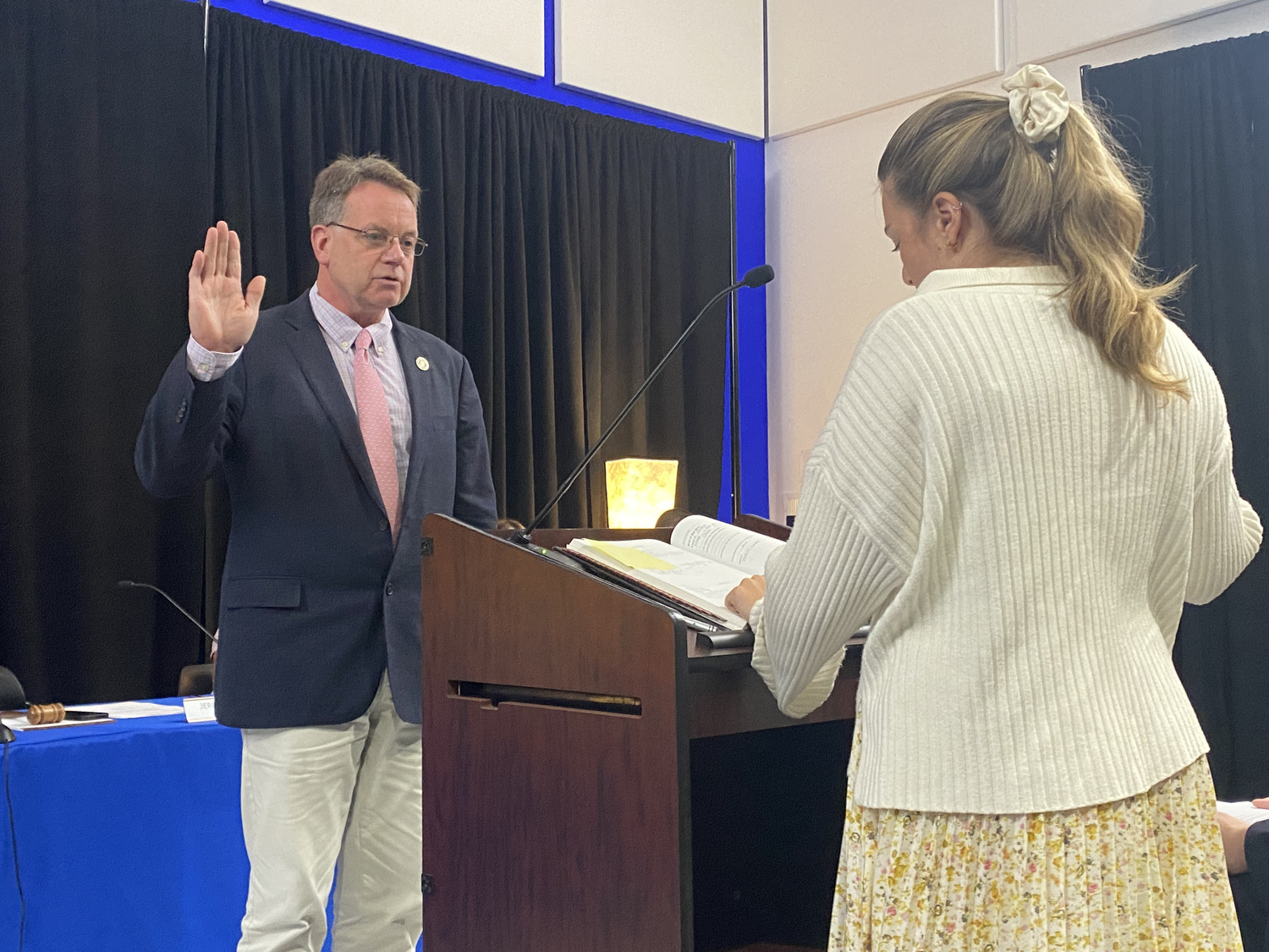 East Hampton Village Mayor Gerry Larsen was sworn in for a second term by Deputy Clerk Gabrielle McKay. CHRISTOPHER WALSH