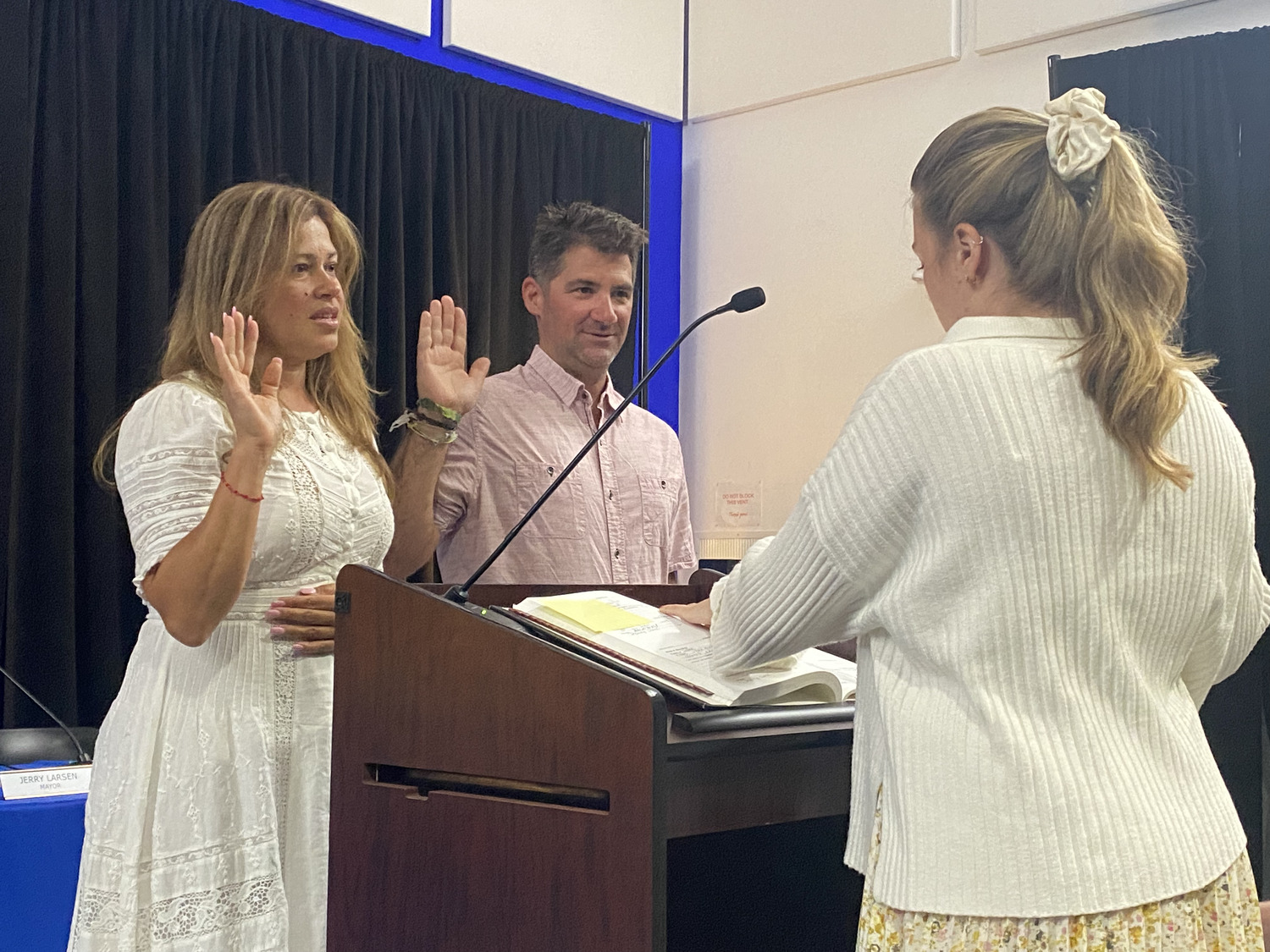 East Hampton Village Trustees Christopher Minardi and Sandra Melendez were sworn in for a second term by Deputy Clerk Gabrielle McKay. CHRISTOPHER WALSH
