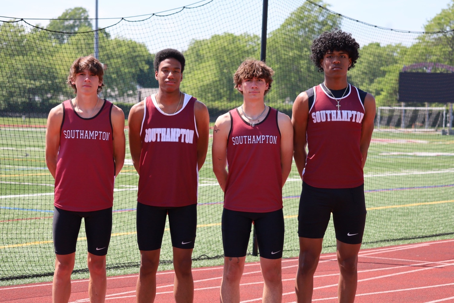 The Southampton boys 4x100-meter relay team of Tanner Marro, left, Devon Palmore, Jett De Sane and Dominick White won a Small Schools title and qualified for the New York State Track and Field Championships.   JAMIE CARLSEN