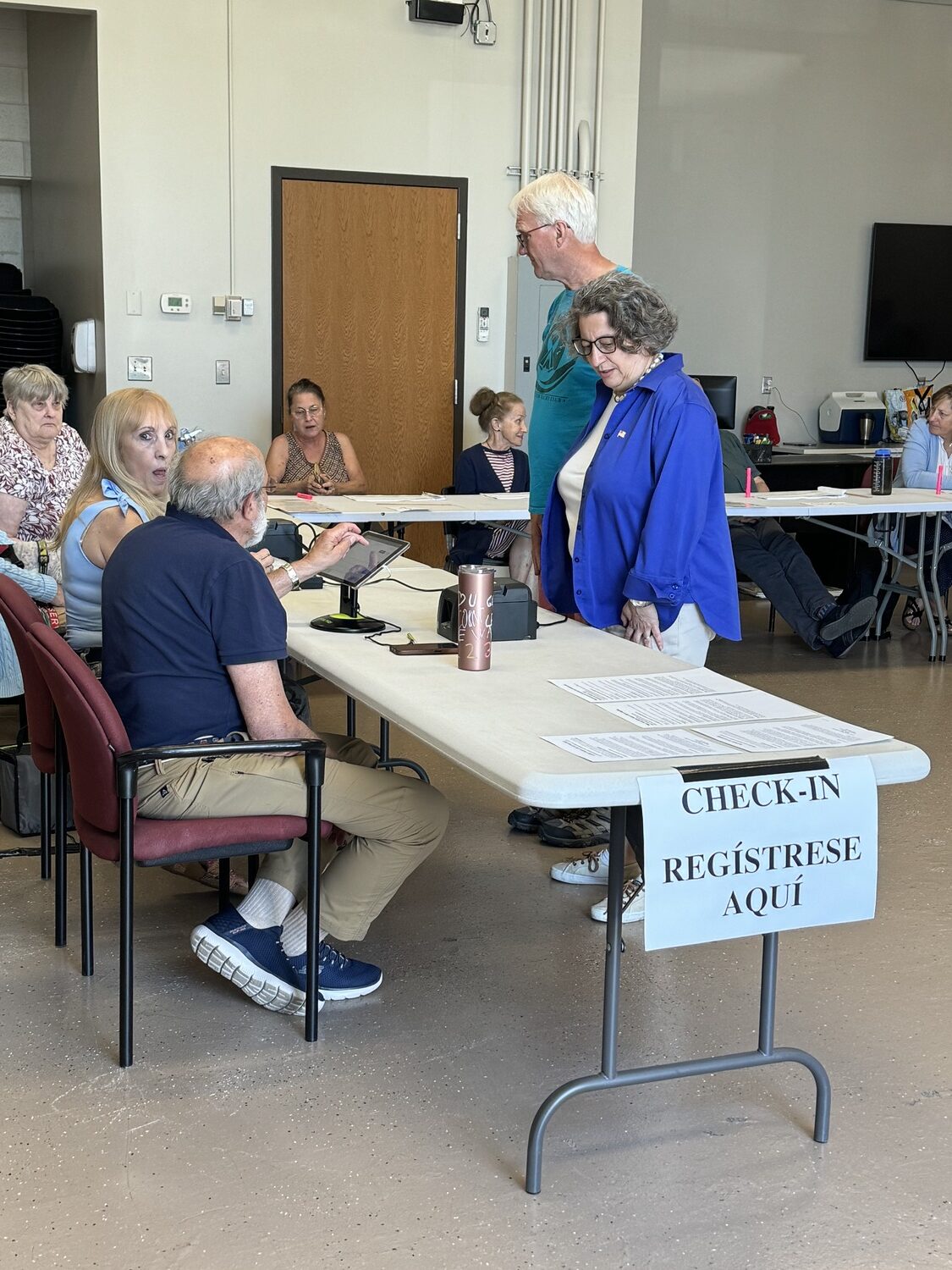 Nancy Goroff, with her husband, Chris Beach, arrived at the North Country Learning Center in Stony Brook to cast her vote on Tuesday. NANCY GOROFF CAMPAIGN