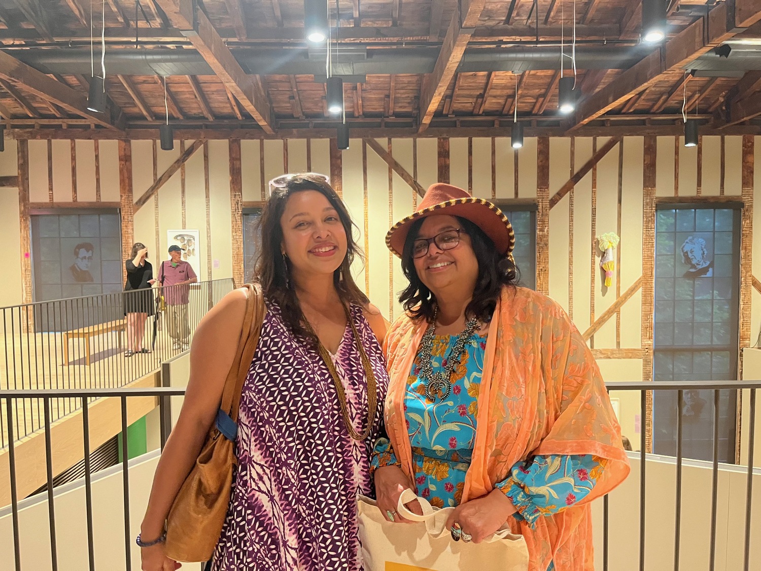 Kelly Darlene Dennis and her mother, artist Denise Silva-Dennis, at the opening of 