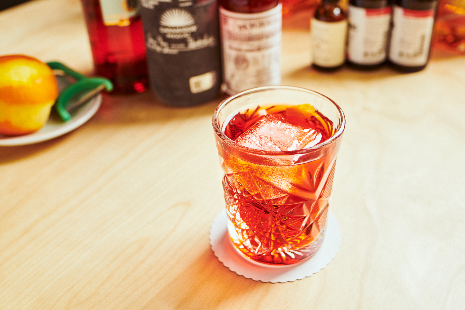 A mezcal Negroni is one of the signature drinks at Arthur + Sons.  MADONNA + CHILD
