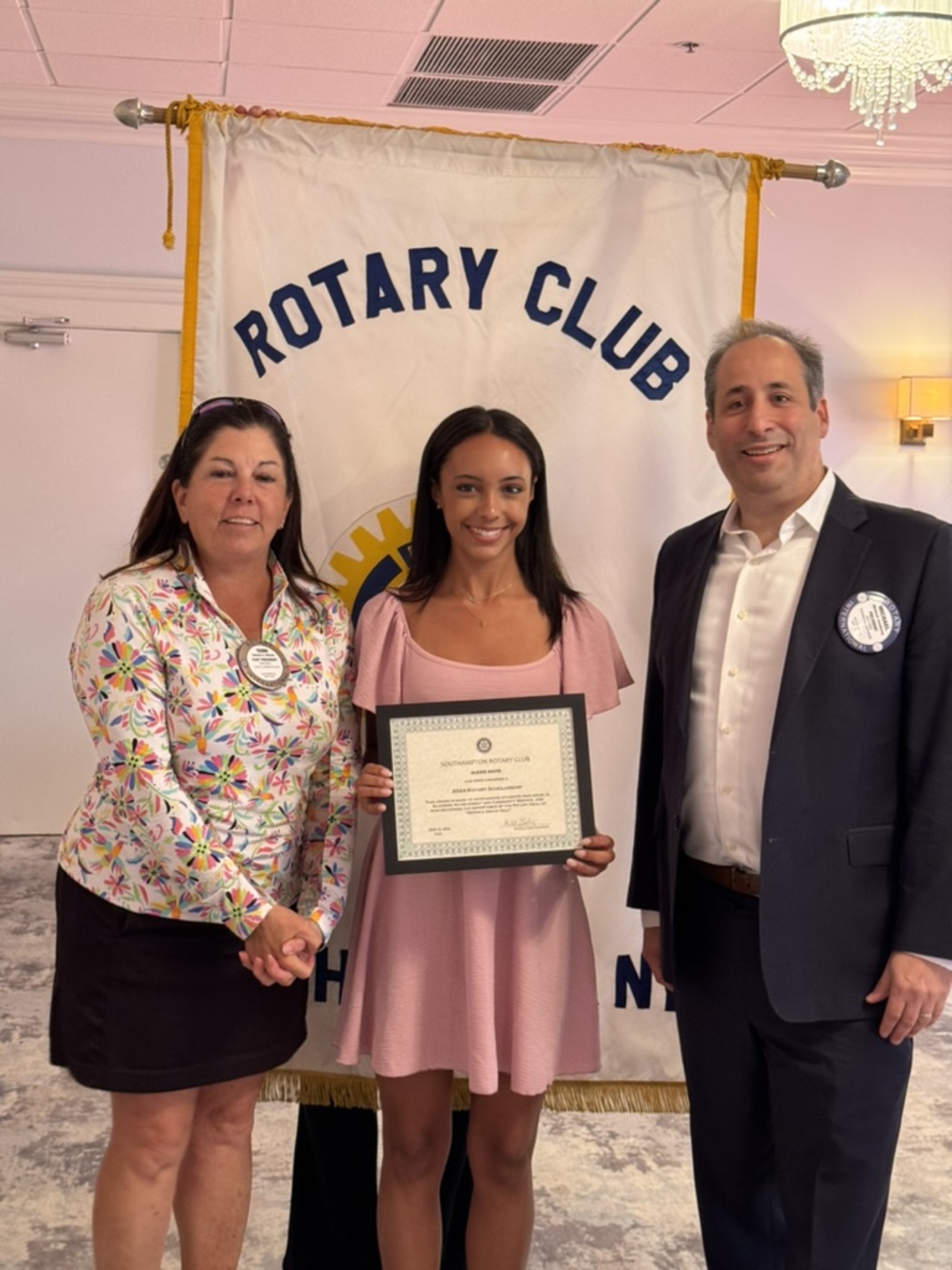 Bridgehampton School senior Alexis Davis was awarded a Southampton Rotary scholarship by Rotarian Terri Kiernan and Rotary President Michael Gomberg.  COURTESY BRIDGEHAMPTON SCHOOL