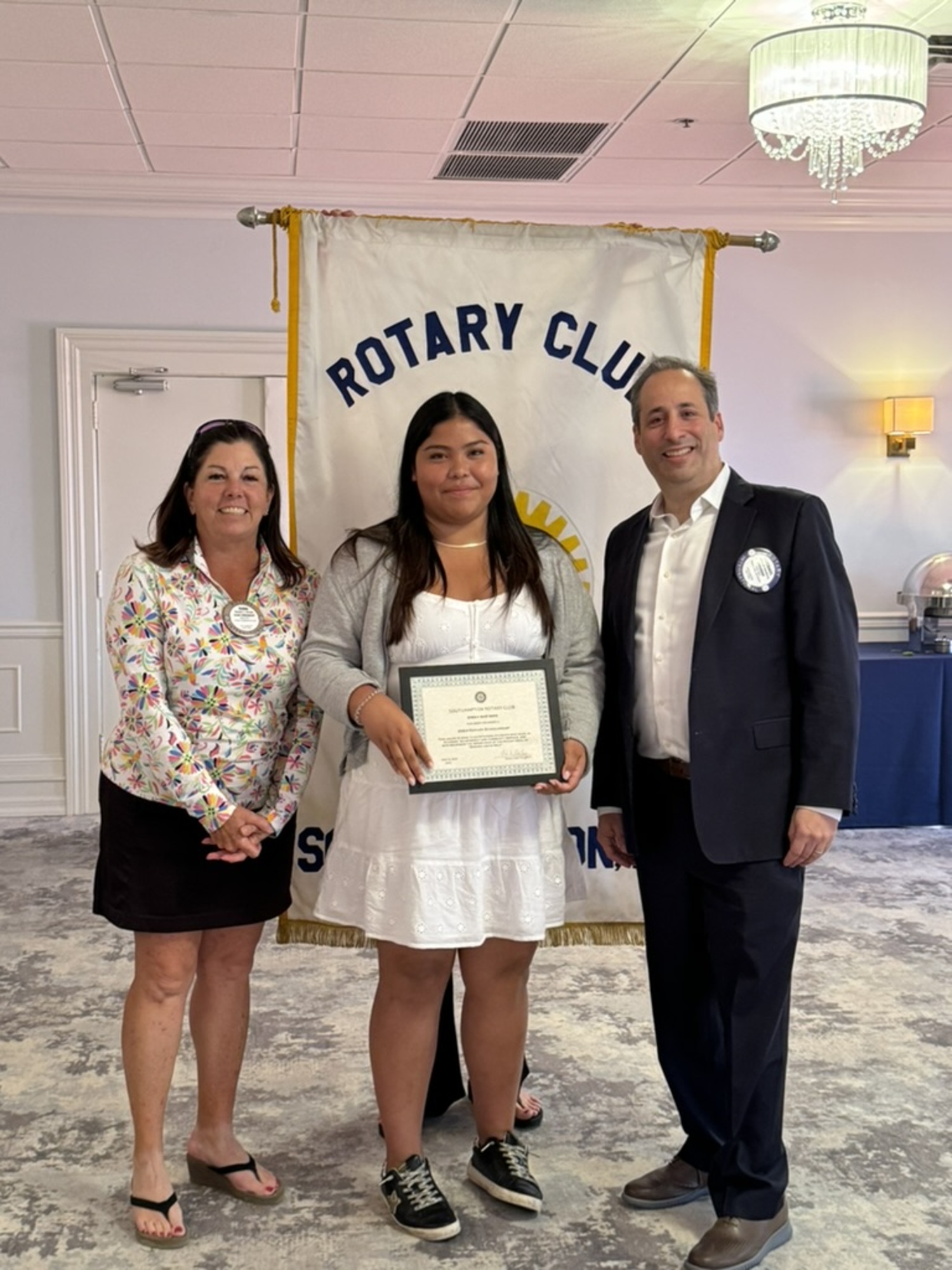 Bridgehampton School senior Sheily Ruiz Soto was awarded a Southampton Rotary scholarship by Rotarian Terri Kiernan and Rotary President Michael Gomberg. COURTESY SOUTHMPTON ROTARY