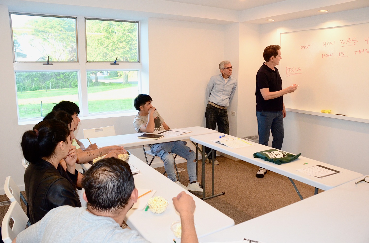 Students in class on a recent Tuesday evening with instructors Richard D'Atille (left) and David Frye (right). KYRIL BROMLEY