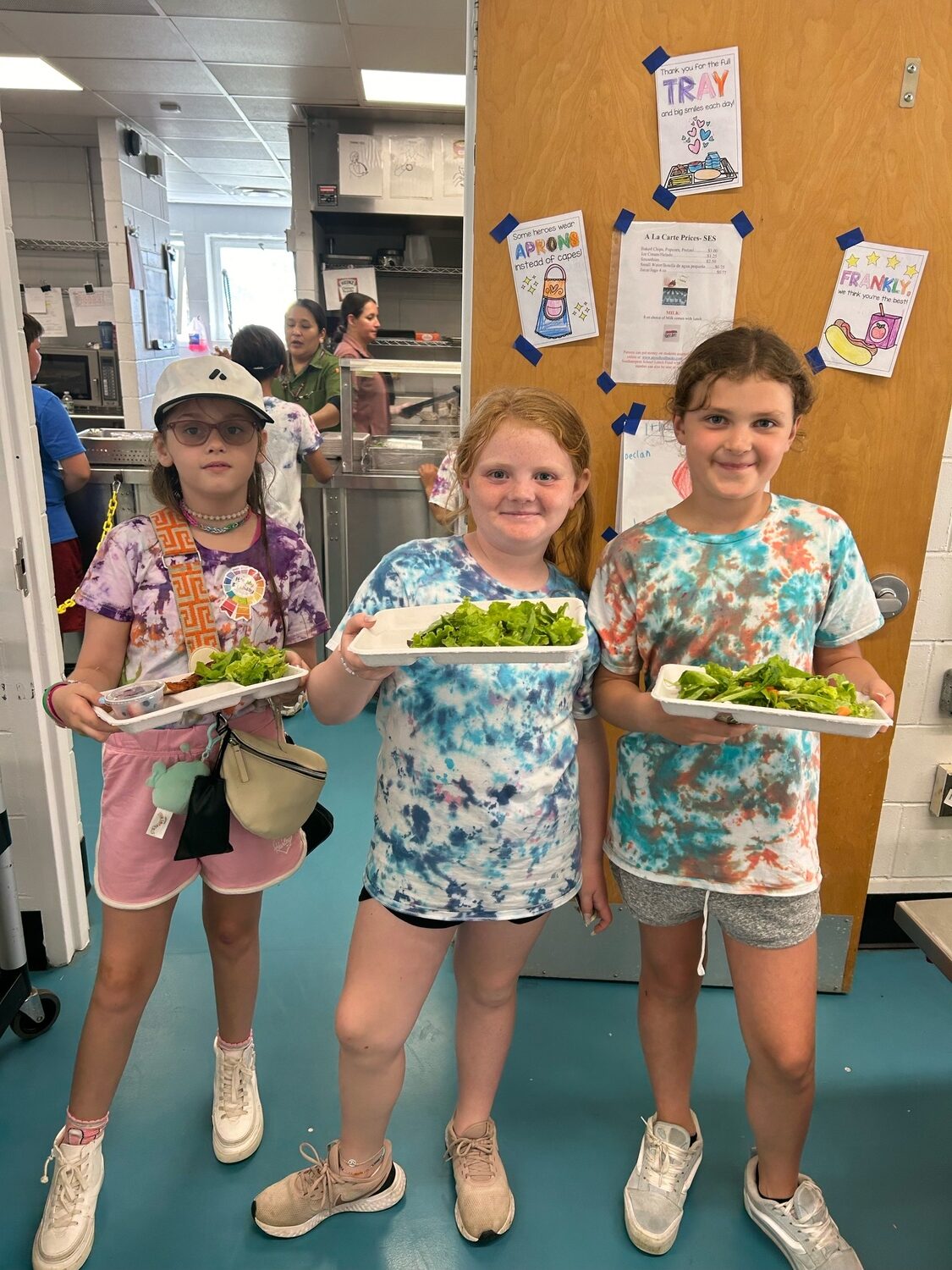 Southampton Elementary School Gardening Club members recently hosted their first farm-to-table lunch at their school. For the lunch, the students planted and cared for lettuce seeds in their school’s indoor tower garden and outdoor garden. Their harvest was served for lunch with the assistance of kitchen staff, who washed and prepped the lettuce. COURTESY SOUTHAMPTON SCHOOL DISTRICT