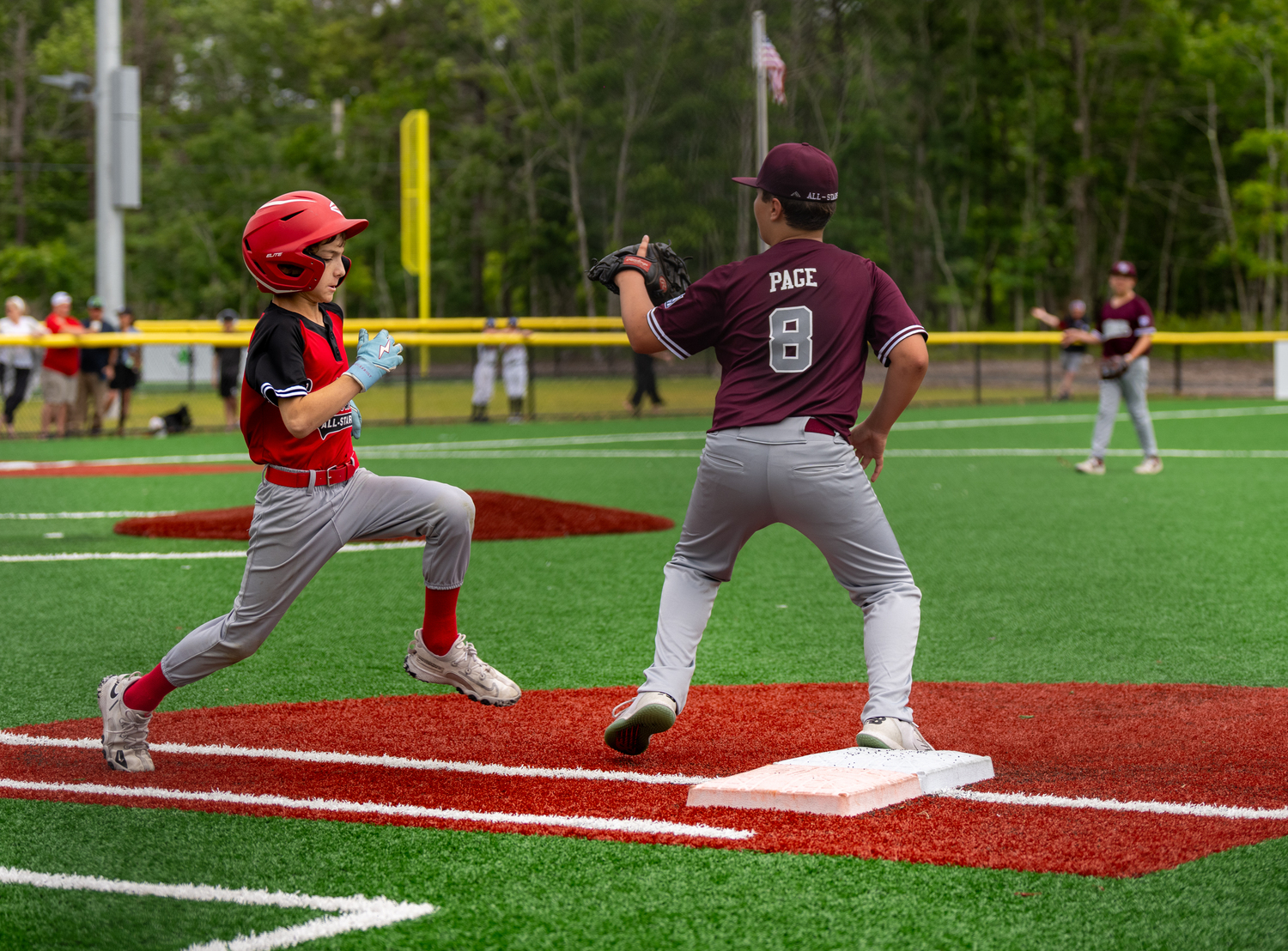 Blaise Marienfield tries to beat out a throw at first base.   RON ESPOSITO