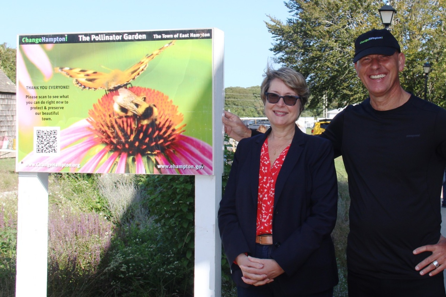 East Hampton Supervisor, Kathy Burke-Gonzalez and ChangeHampton’s Stephan Van Dam at the sign in the garden. COURTESY GAIL PELLETT.