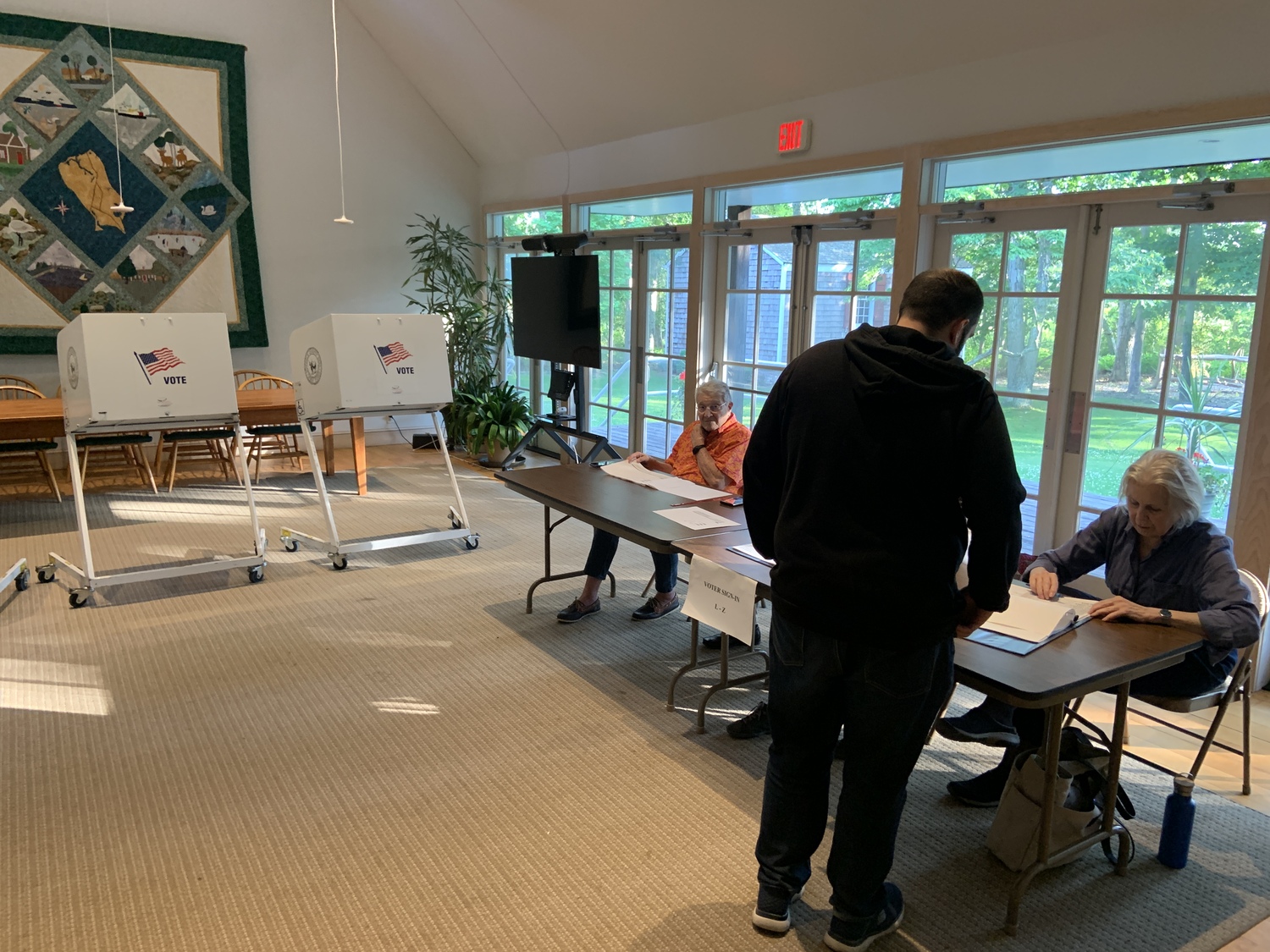 A voter checked into the polling place in North Haven  on Tuesday afternoon. STEPHEN J. KOTZ