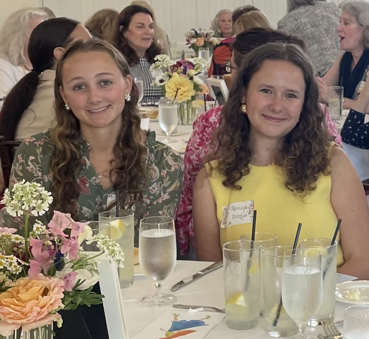 The Westhampton Woman's Club awarded scholarships to two Westhampton Beach High School seniors --  Melina Pinonzek, left, who is headed to Virginia Tech to study nutrition and dietetics, and Patricija Dirzius, who will attend Cornell to study applied economics and management --at their annual luncheon. COURTESY WESTHAMPTON WOMAN'S CLUB