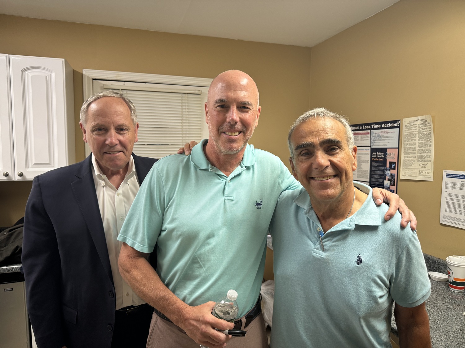 Mayor Gary Vegliante, right, with Trustee Michael Craig, center, and attorney Joseph Prokop on Friday night after the incumbents were swept out of office by voters. Vegliante and Prokop were the village's founding fathers in 1993 and Vegliante had only been challenged for mayor once in his 30-plus years in office. MICHAEL WRIGHT
