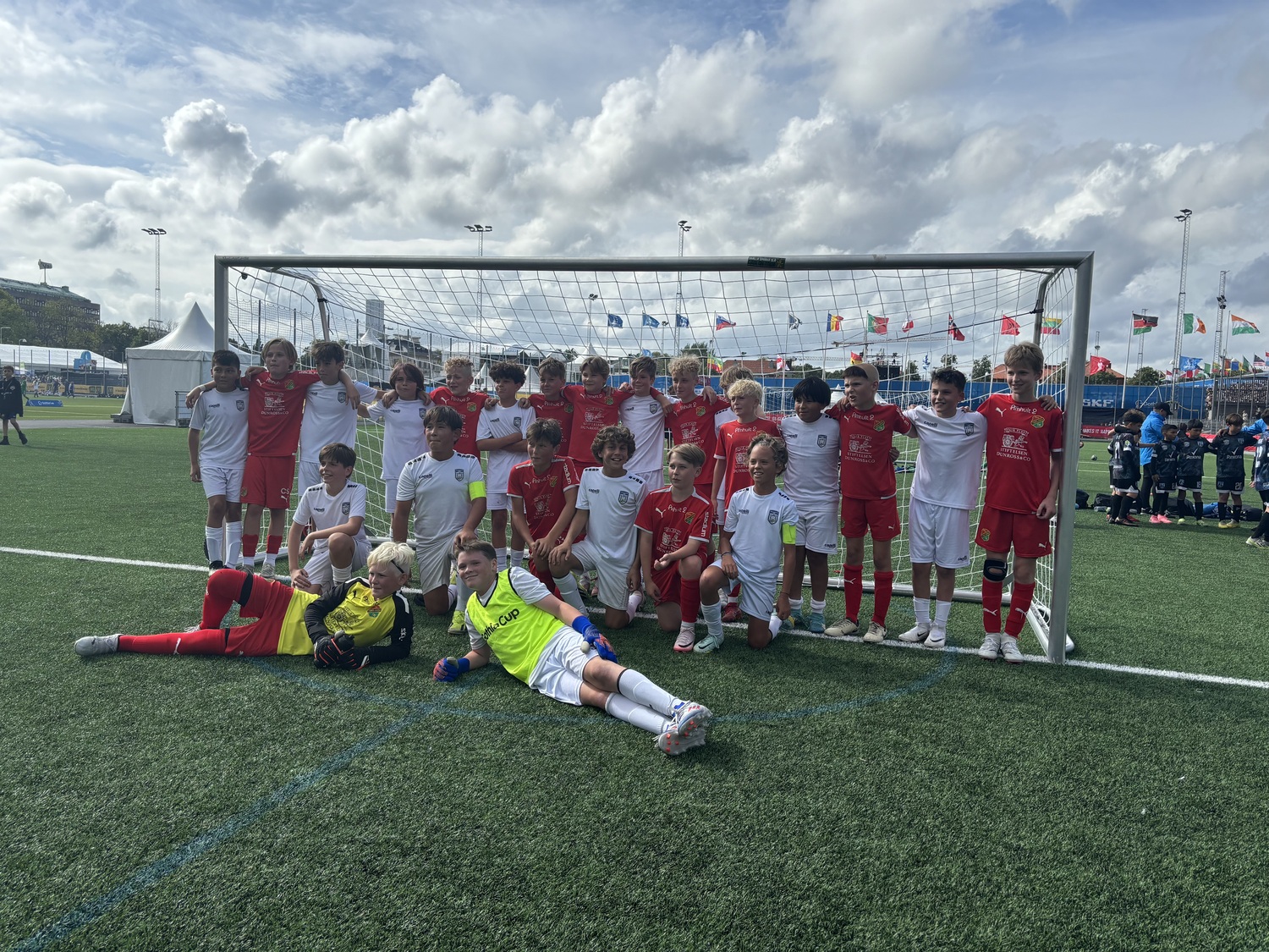 The 2012 boys team with players from another squad at the Gothia Cup in Sweden.