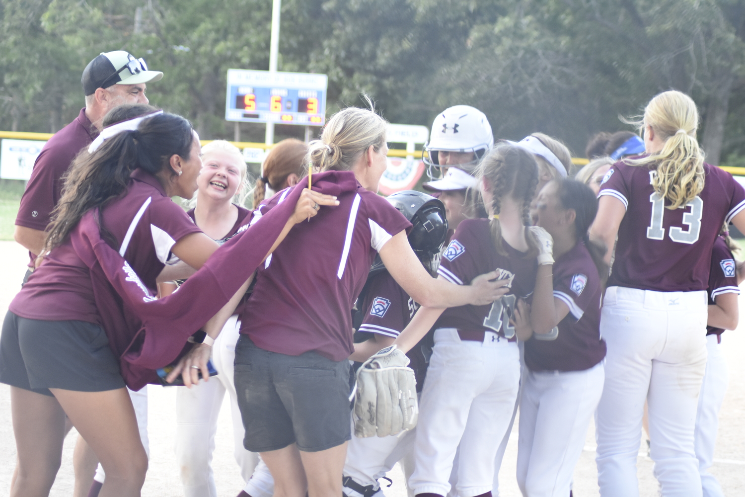 East Hampton celebrates after Blakely Ball recorded the final out for the District 36 Championship.   DREW BUDD