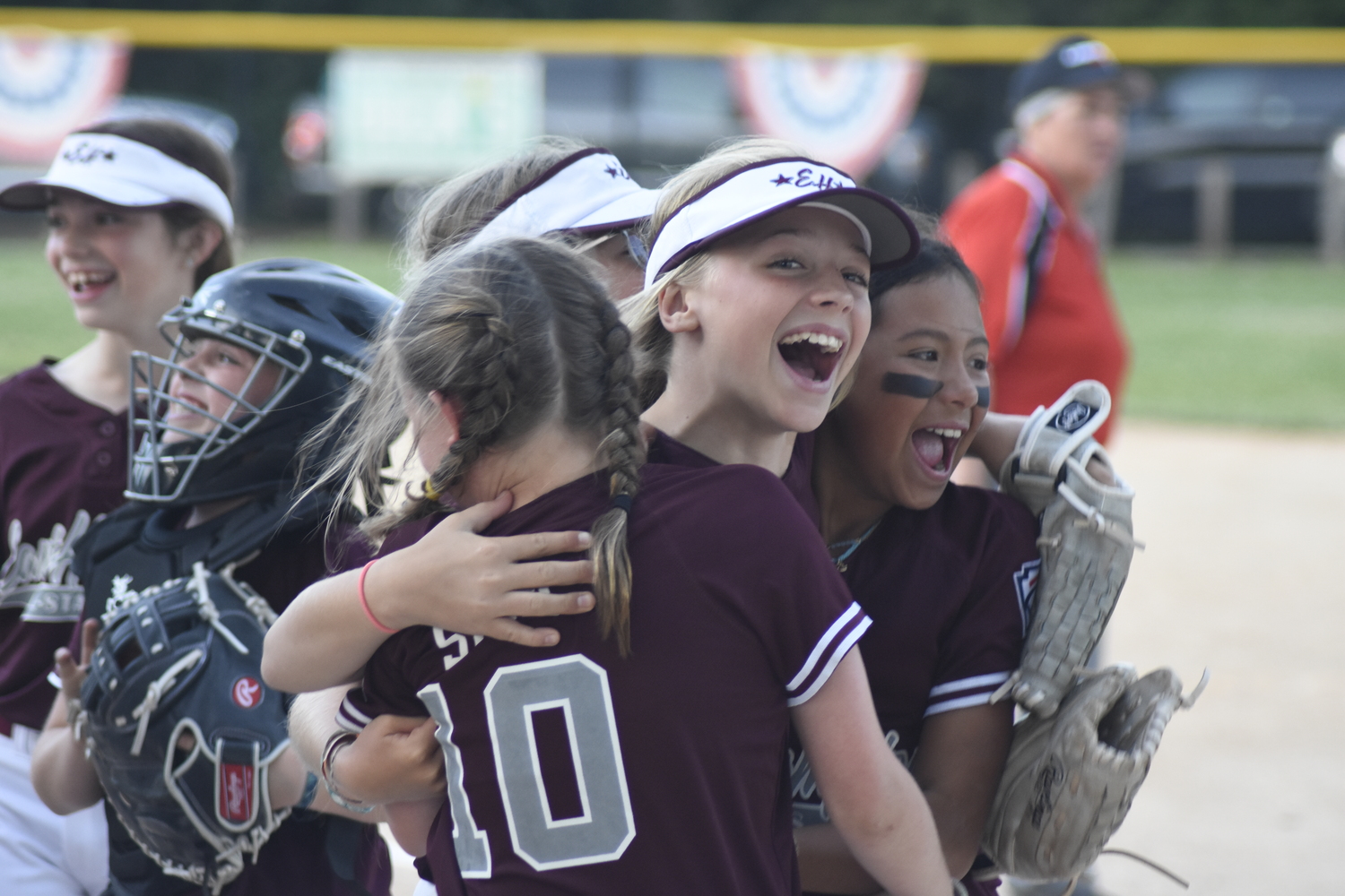 East Hampton celebrates after Blakely Ball recorded the final out for the District 36 Championship.   DREW BUDD