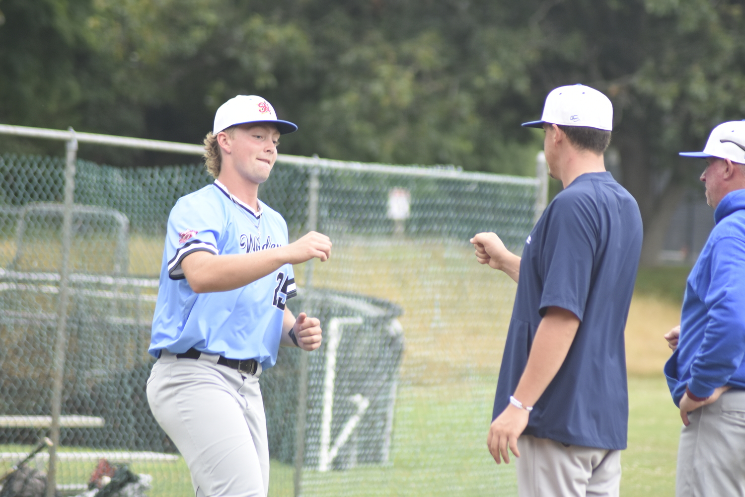 Brett Borcherding (Rose-Hulman Tech) comes out to greet his Blue Team All-Star coaches and teammates during player introductions on Saturday afternoon.   DREW BUDD