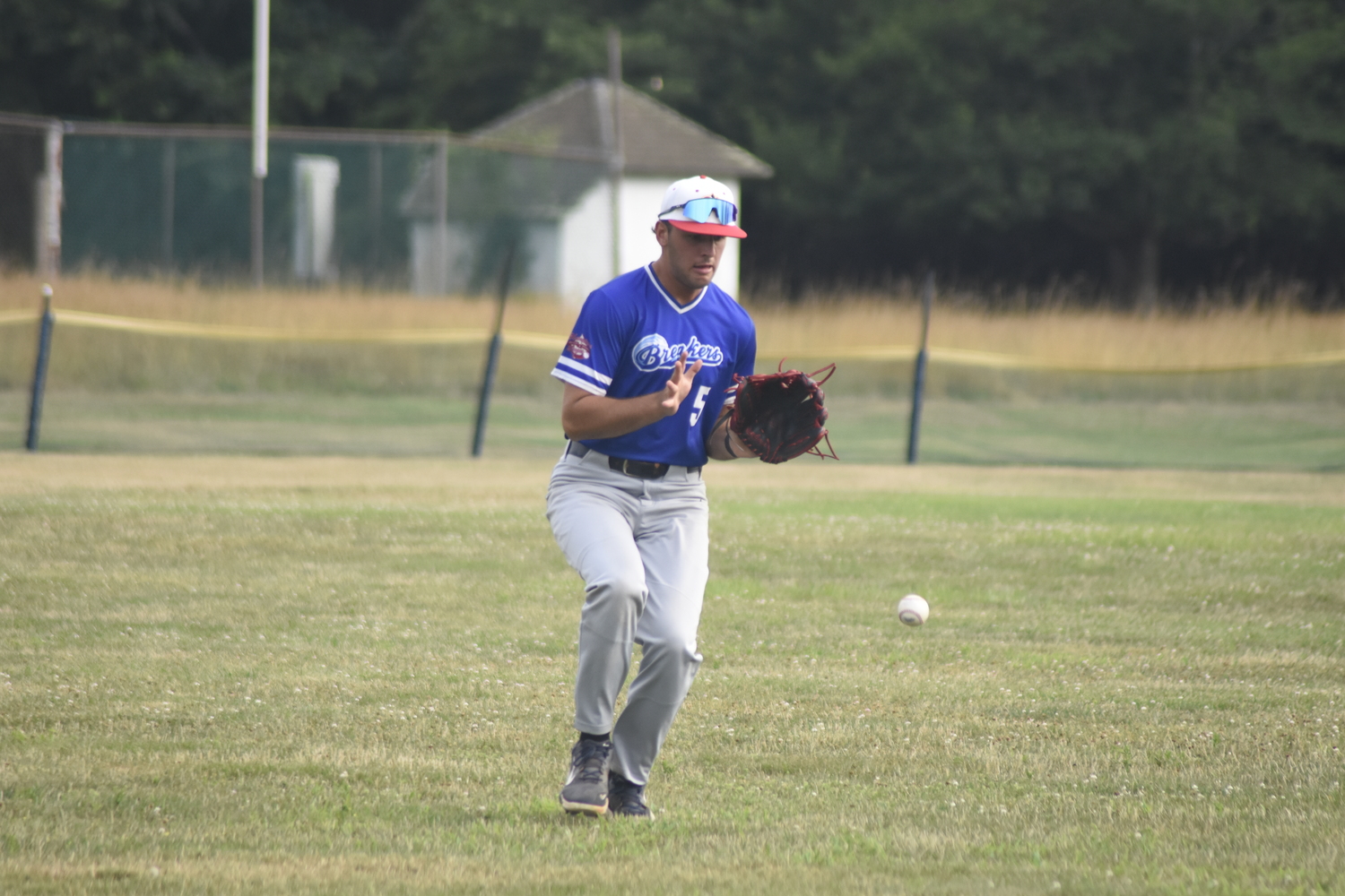 Michael Vilardi (Queens) plays a base hit on the hop.  DREW BUDD