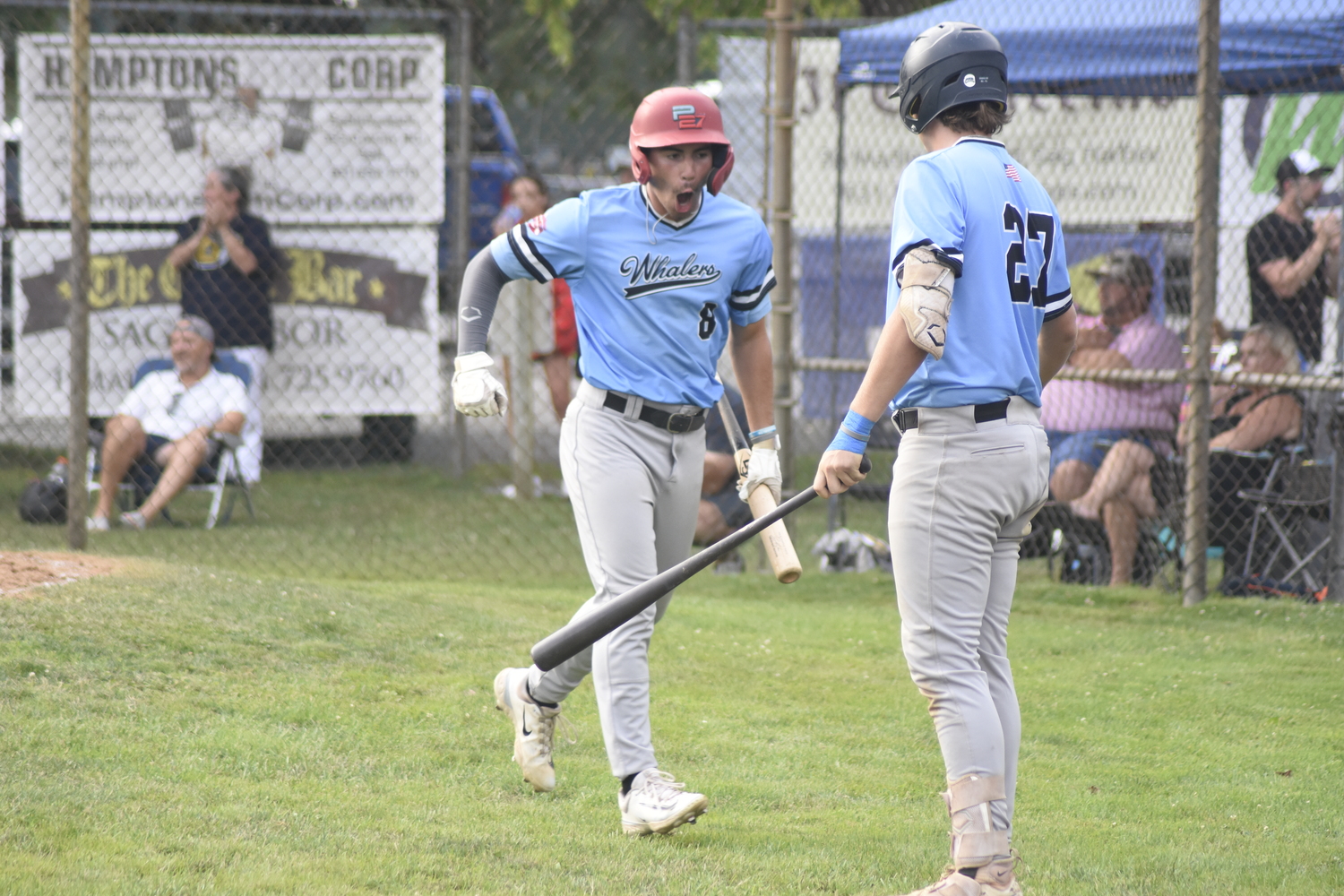 Tucker Genovesi (St. Bonaventure) is pumped up after scoring a run.  DREW BUDD