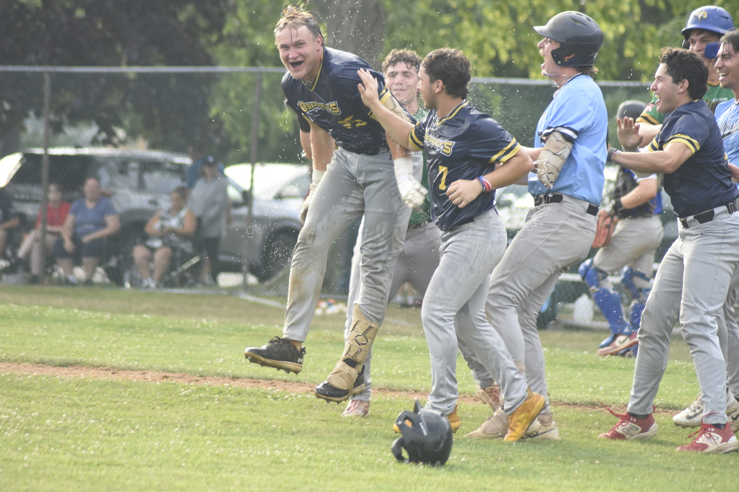 Nick Pratt is drenched in water.  DREW BUDD