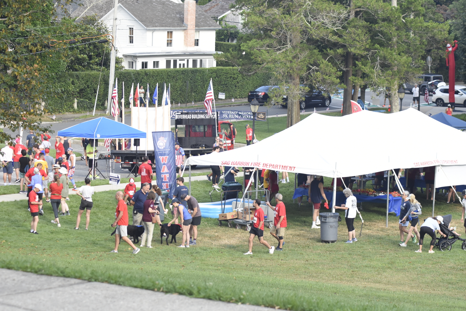 Jordan's Run sets up shop on the grounds of the Pierson Middle/High School on Sunday morning.   DREW BUDD