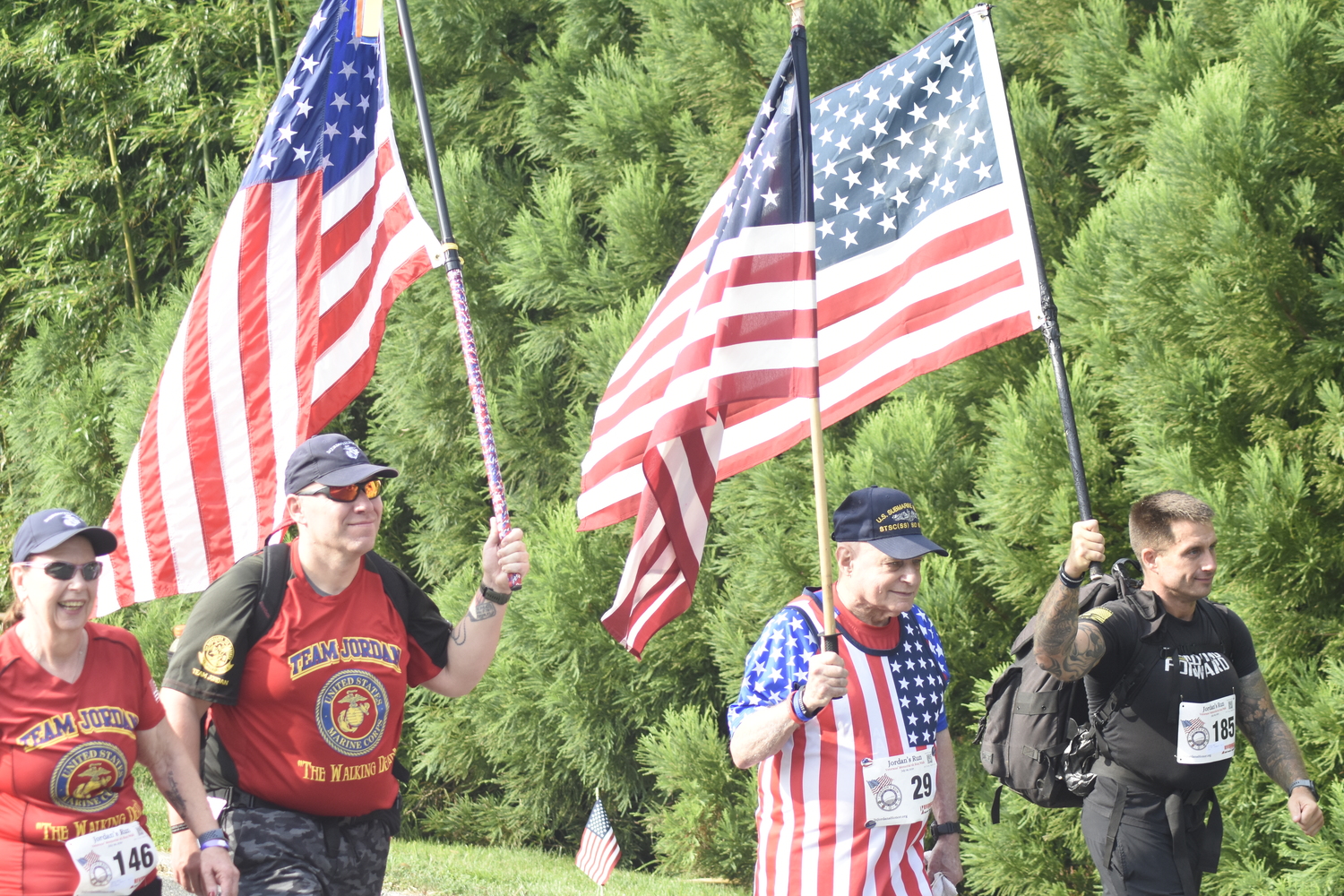 Raising the flags high.   DREW BUDD