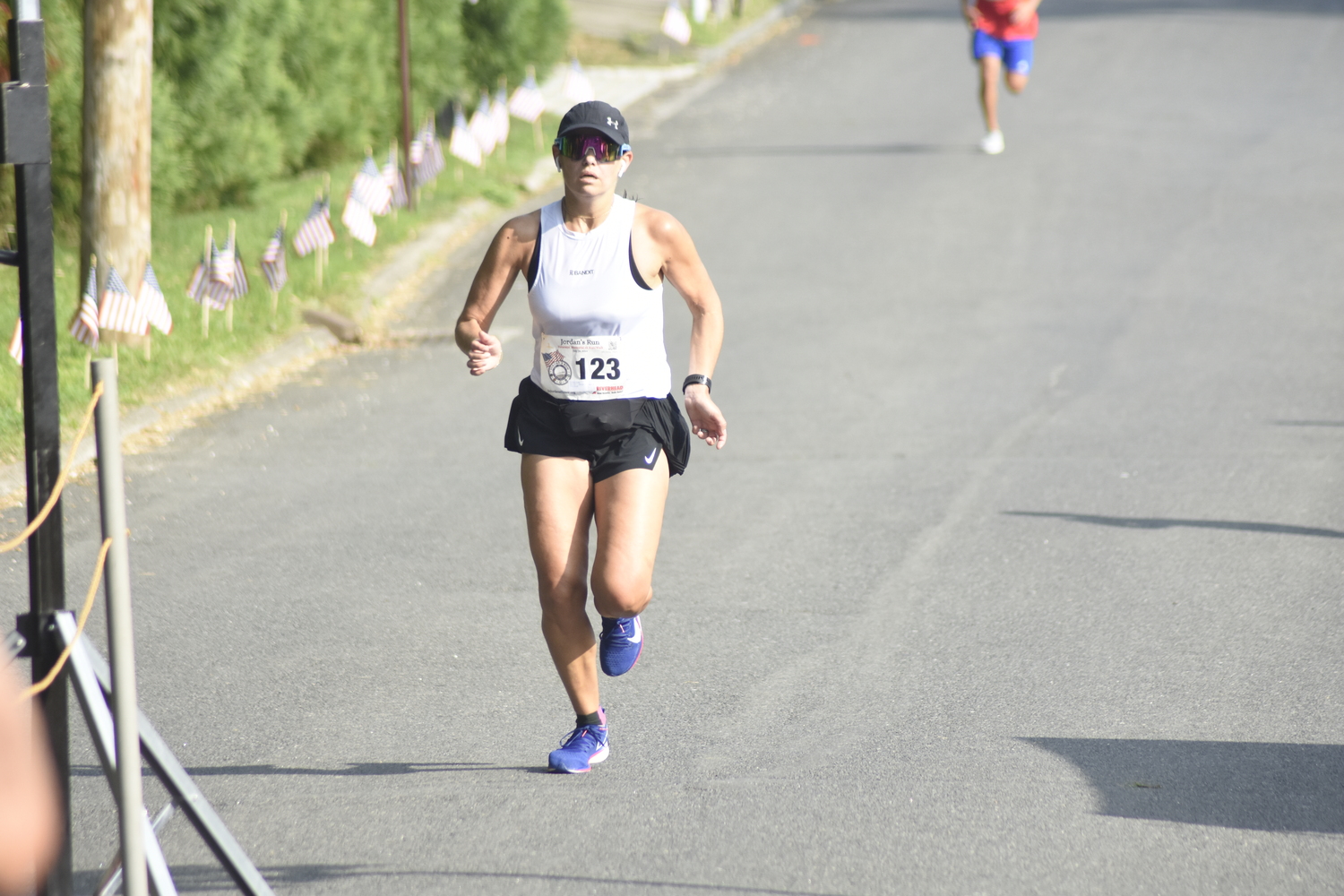 Emily Kenyon finished third among women.   DREW BUDD