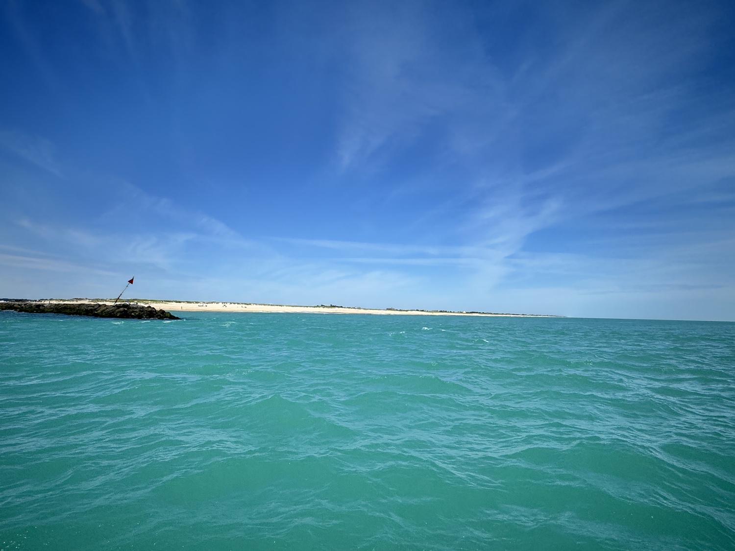 Marine scientists believe that a rare bloom of oceanic phytoplankton is the reason for the turquoise color of the ocean off the Long Island's coastline in recent weeks. The bloom was likely sparked by sustained strong winds in late June that stirred up nutrients usually on the sea floor, feeding an explosion in the numbers of a specific species of plankton that have a chalky calcium exoskeleton and have been known to tint waters a similar color in other areas.