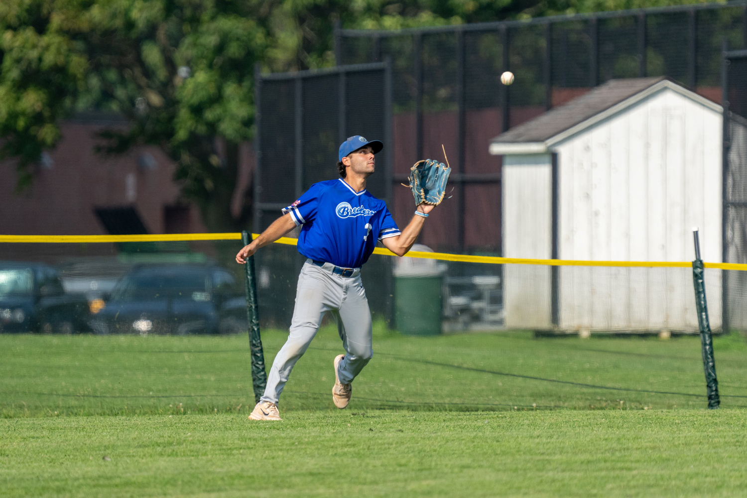 Cole Maucere (New Haven University) lines up a fly ball in right field.   RON ESPOSITO