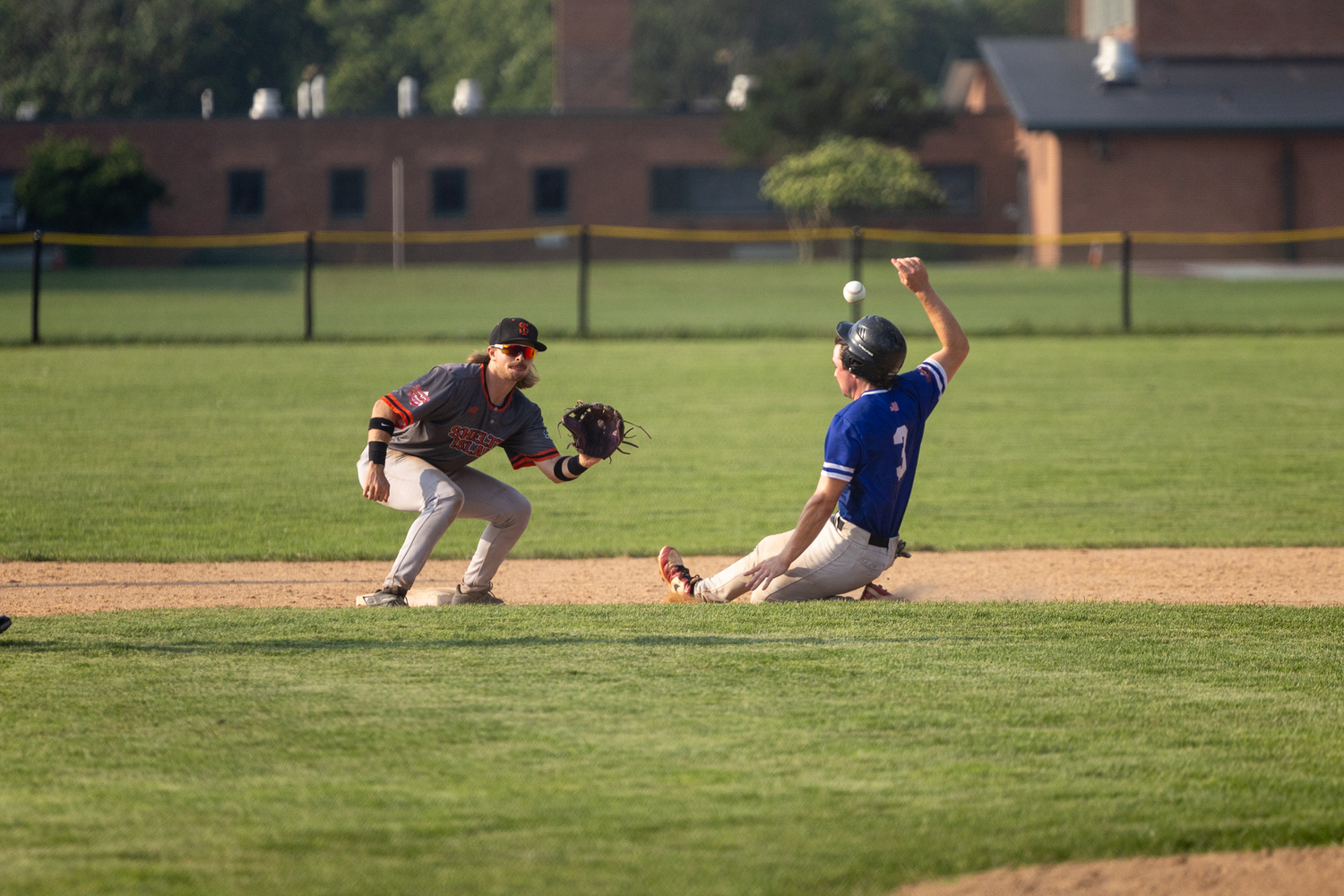 Ty Gilligan (Dominican) steals second base.   RON ESPOSITO