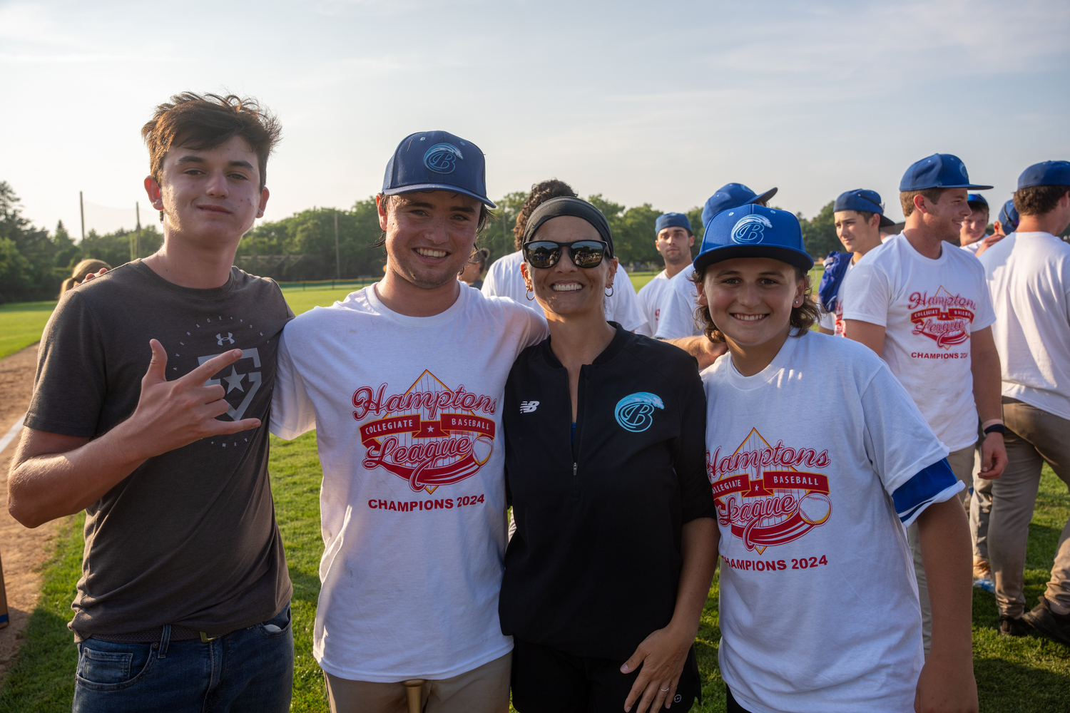 Ty Gilligan with his host family Noah, Sara and Kai Kent.   RON ESPOSITO