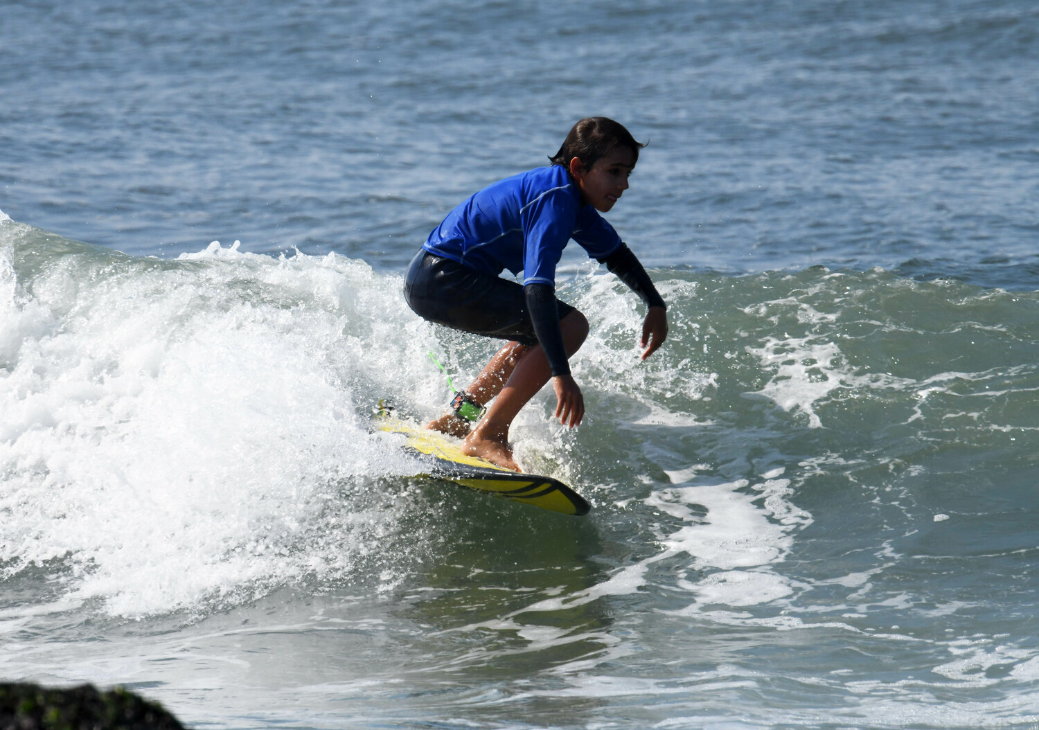 A young surfer enjoying the waves at Ditch Plains. DOUG KUNTZ