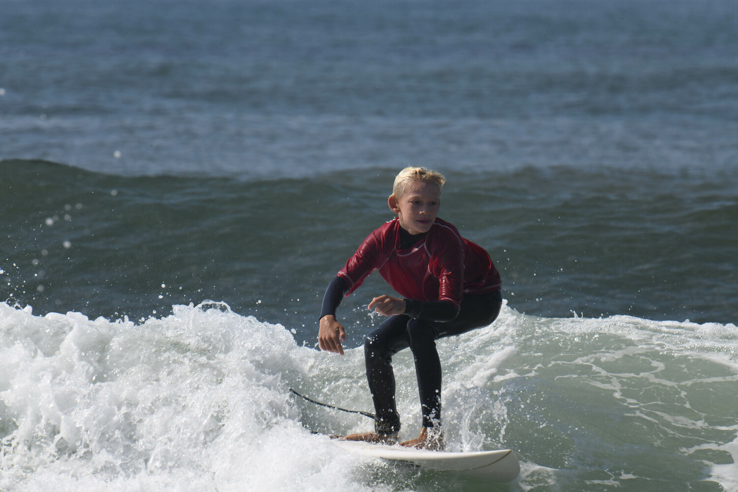 A young surfer enjoying the waves at Ditch Plains. DOUG KUNTZ