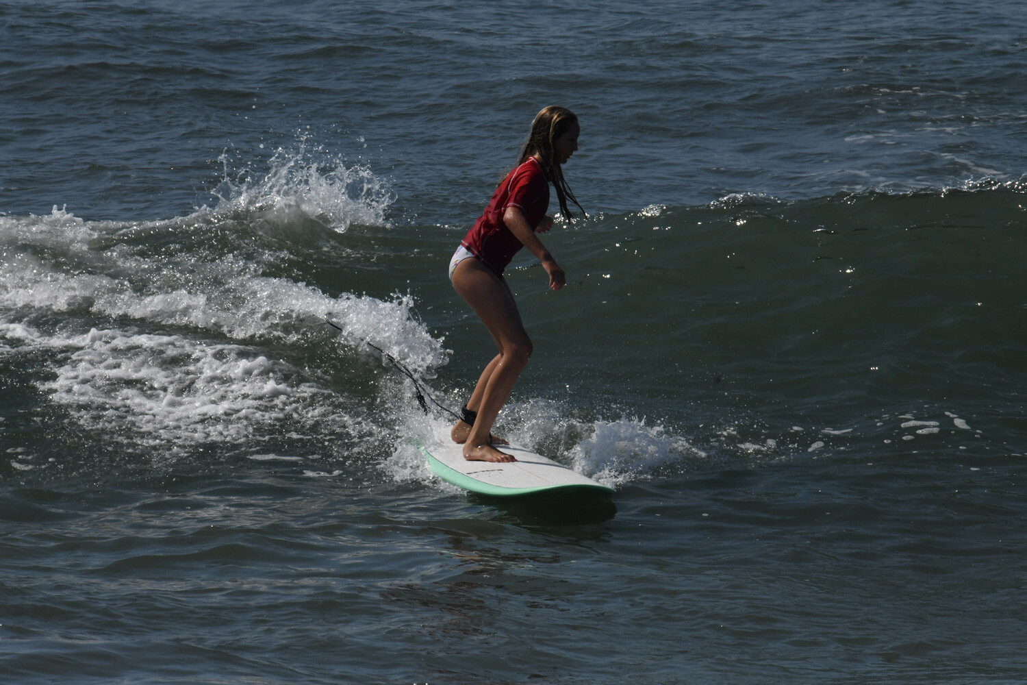 A young surfer enjoying the waves at Ditch Plains. DOUG KUNTZ