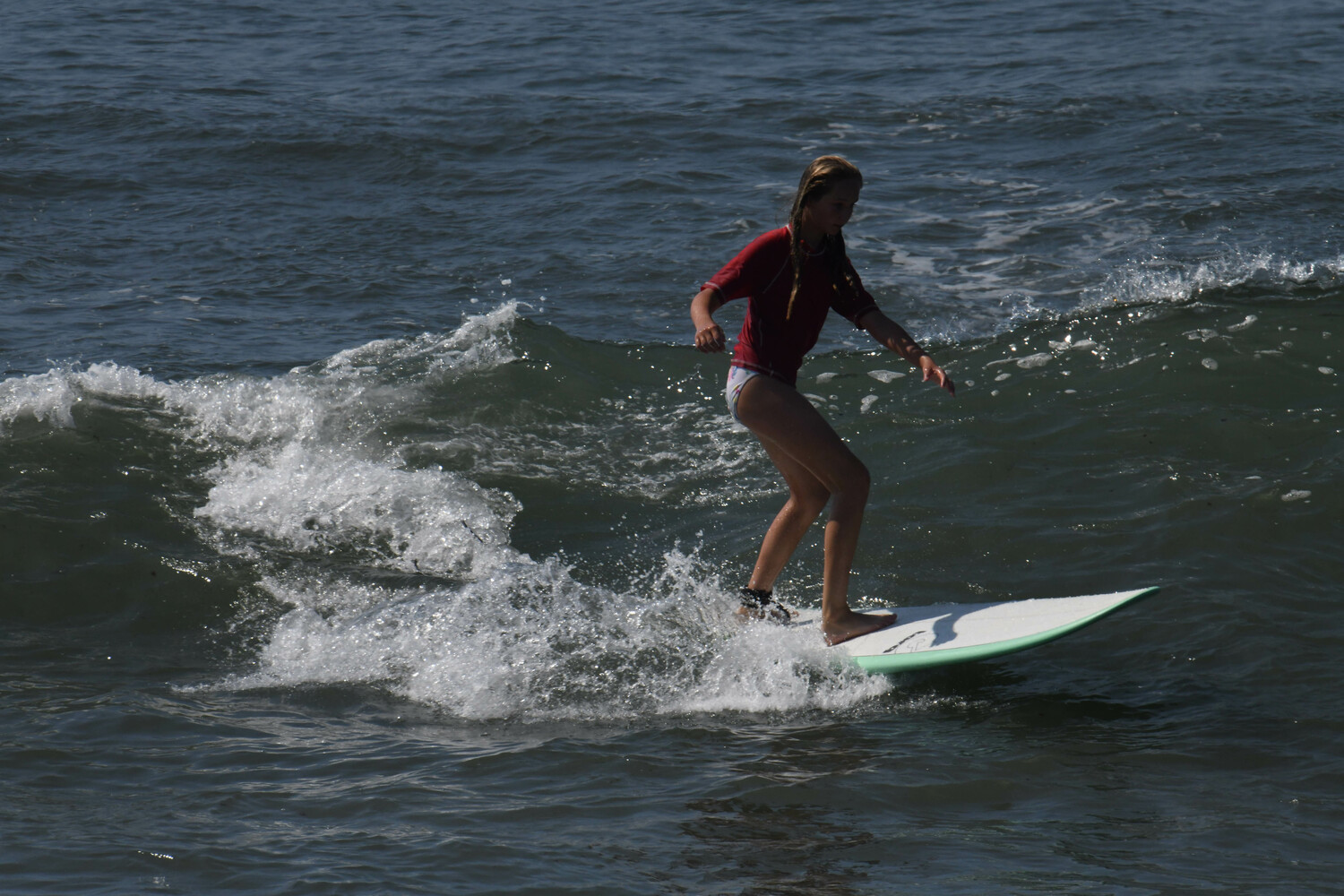 A young surfer enjoying the waves at Ditch Plains. DOUG KUNTZ