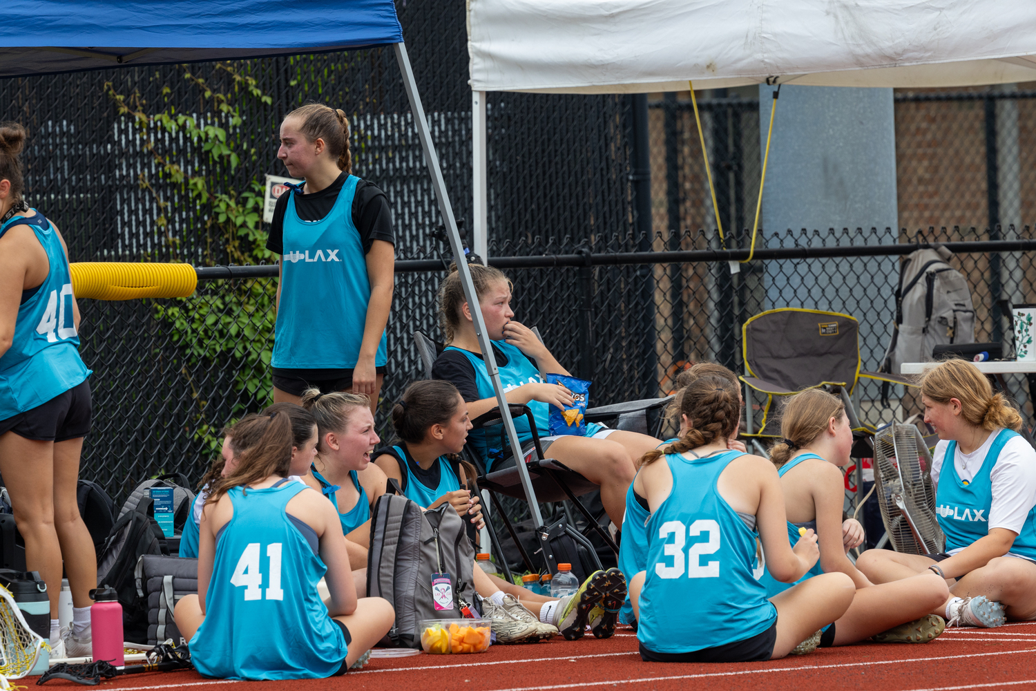 Hauppauge players rest and relax in between games.  RON ESPOSITO