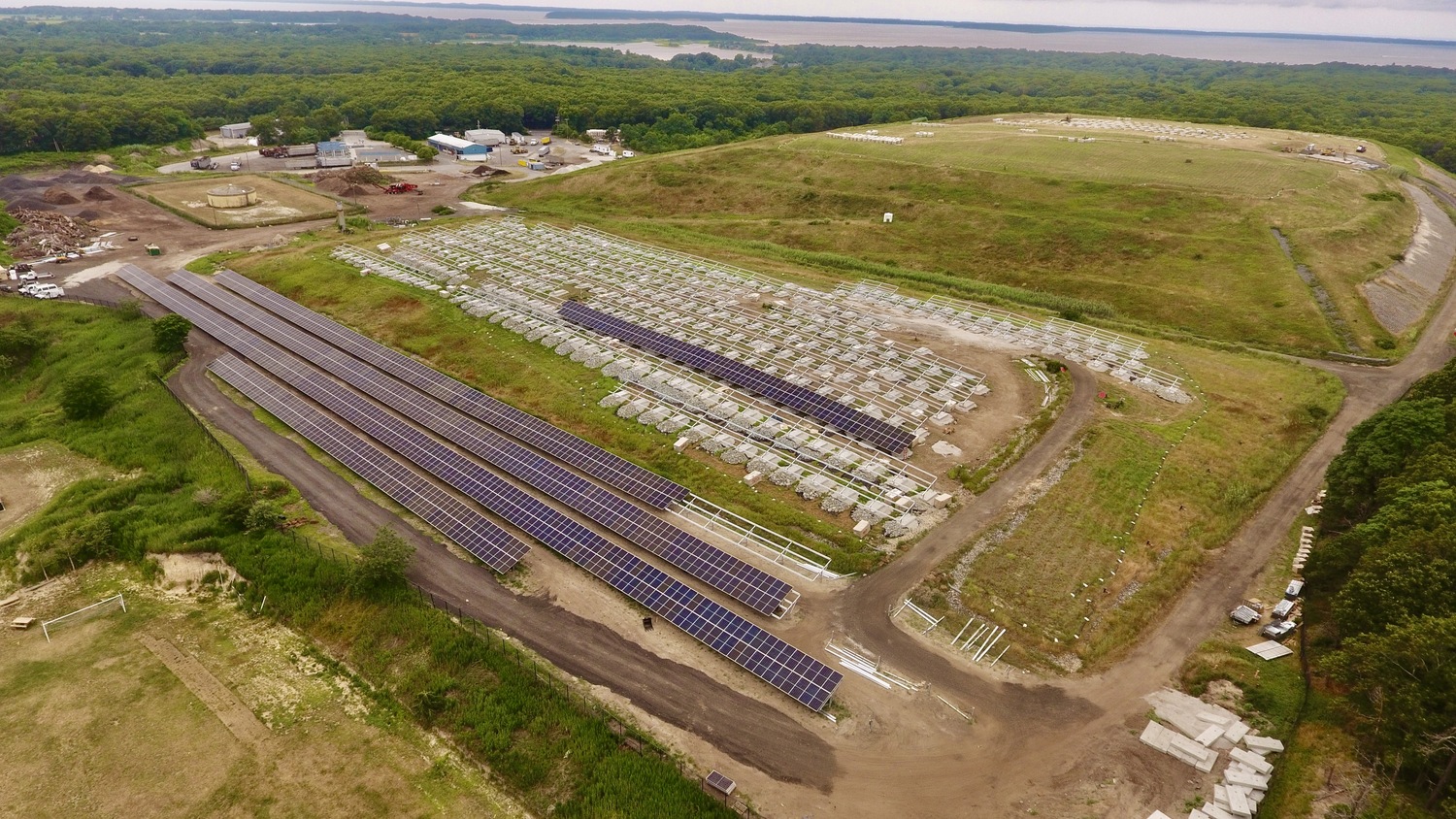 A 4 megawatt solar farm is currently under construction atop a section of the capped former Southampton Town landfill on Majors Path in North Sea, a first of its kind project on the South Fork that renewable energy advocates say could be a boost for finding creative places to put solar arrays. MICHAEL WRIGHT