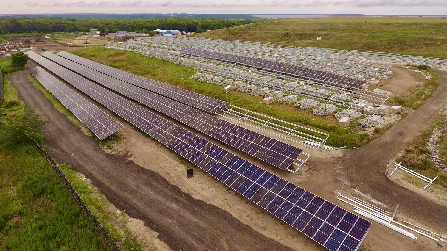 A 4 megawatt solar farm is currently under construction atop a section of the capped former Southampton Town landfill on Majors Path in North Sea, a first of its kind project on the South Fork that renewable energy advocates say could be a boost for finding creative places to put solar arrays. MICHAEL WRIGHT