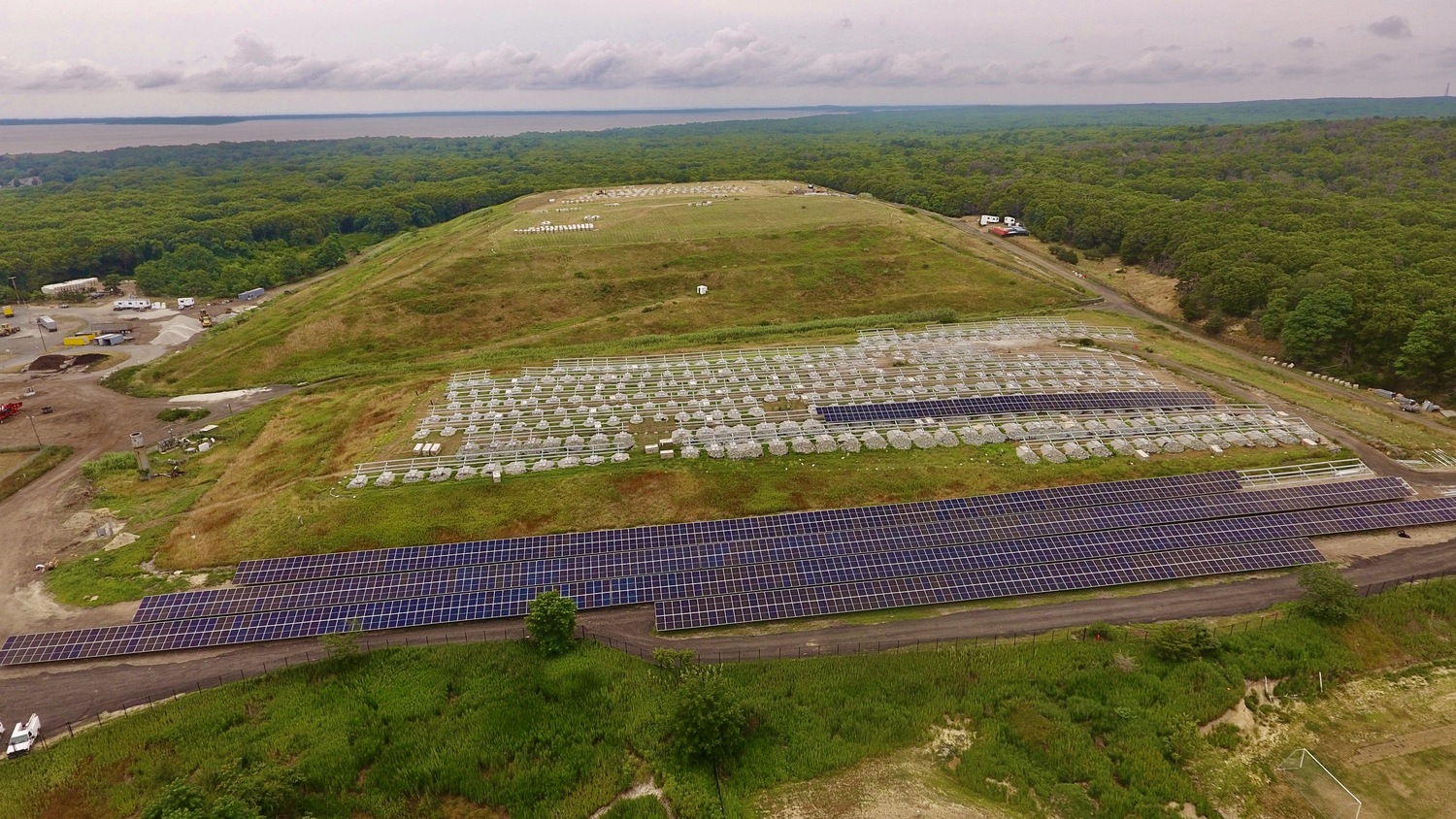 A 4 megawatt solar farm is currently under construction atop a section of the capped former Southampton Town landfill on Majors Path in North Sea, a first of its kind project on the South Fork that renewable energy advocates say could be a boost for finding creative places to put solar arrays. MICHAEL WRIGHT