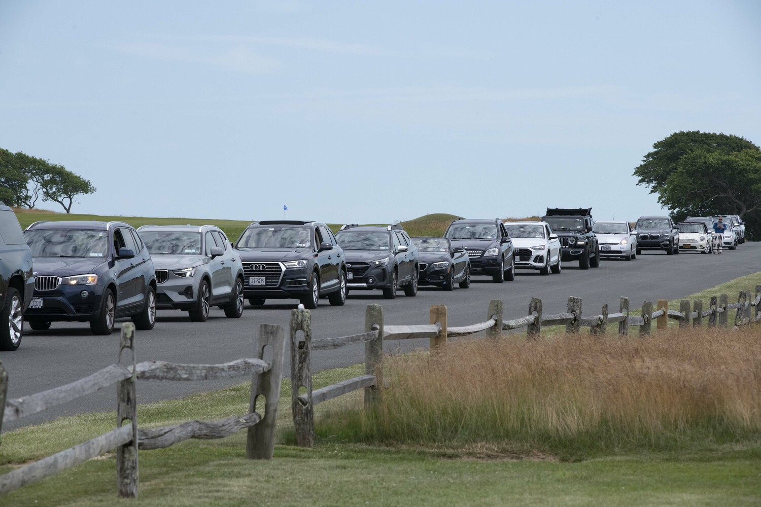 Traffic is backed up on Old Beach Lane in East Hampton as President Biden heads out to a fundraise via motorcade on Saturday afternoon in East Hampton. 
 DOUG KUNTZ