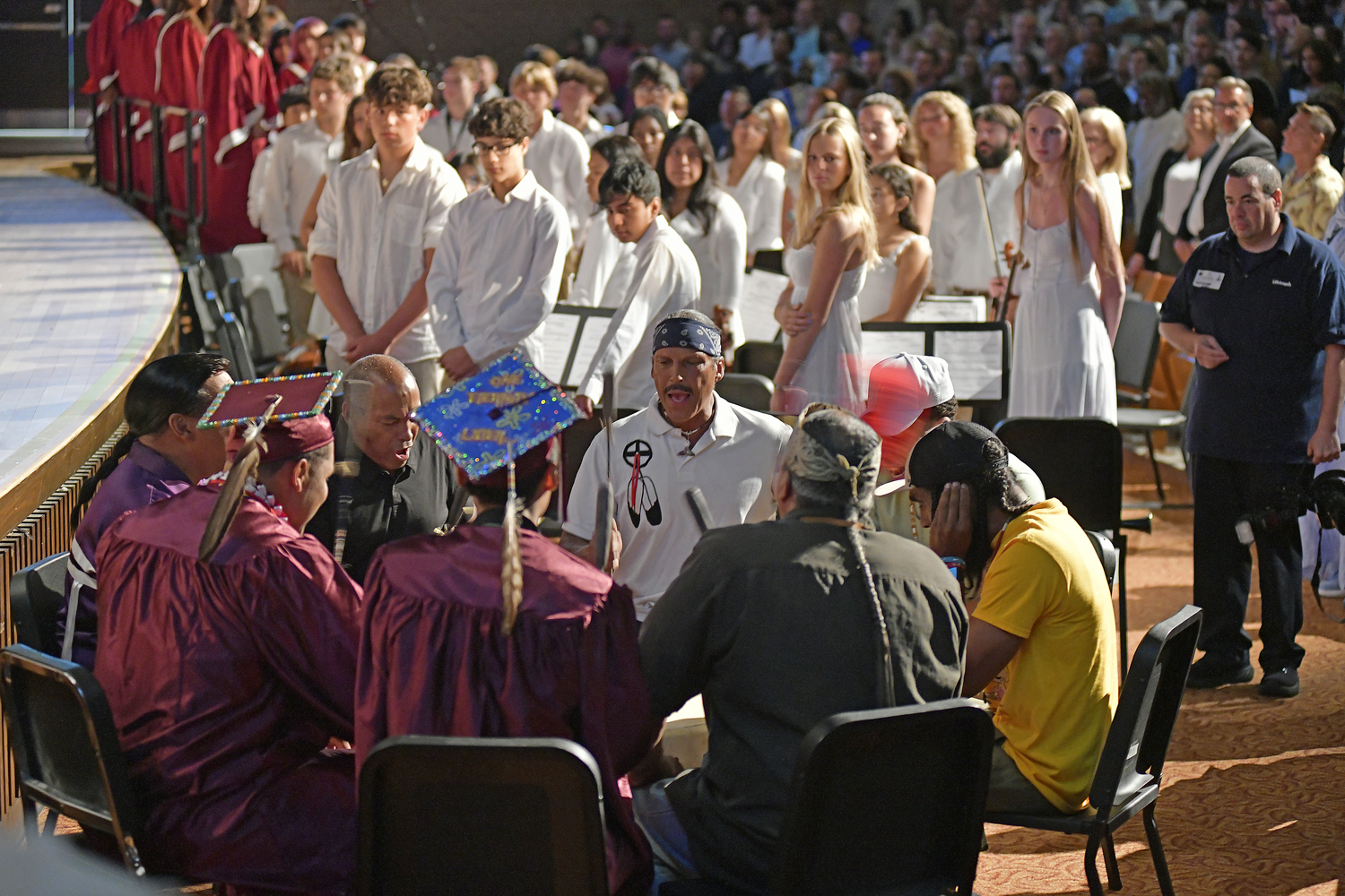 The Youngblood Singers from the Shinnecock Nation perform an honor song for the graduates.  DANA SHAW