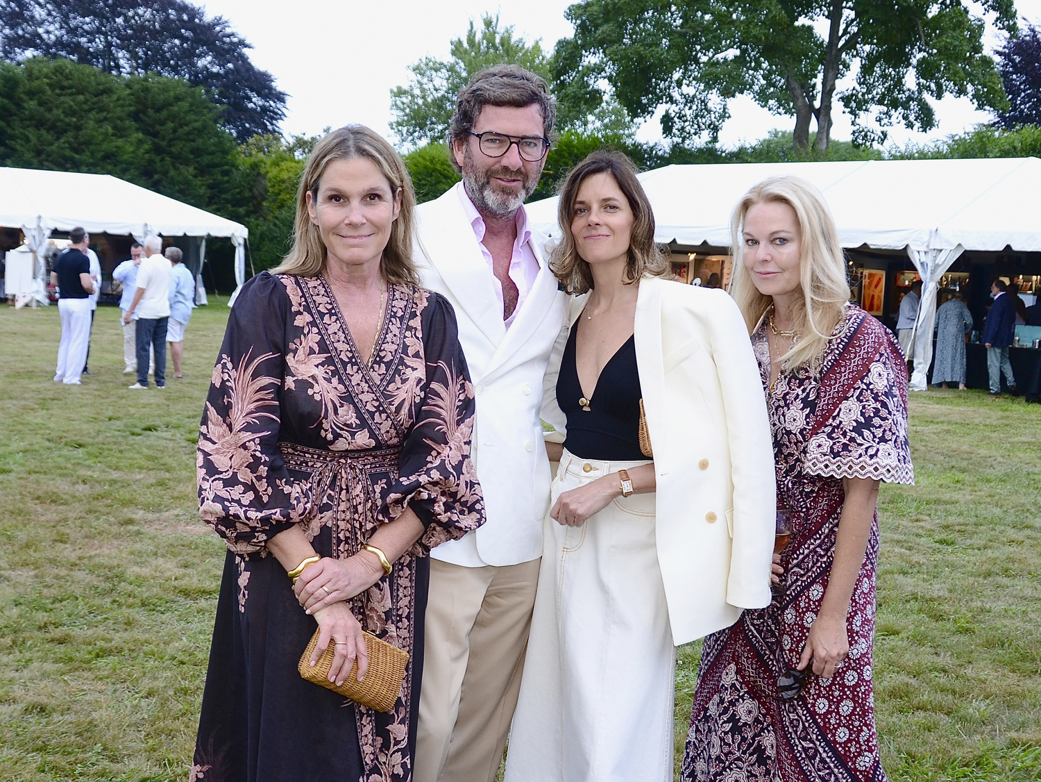 Aerin Lauder, David Netto, Helen Rice and Lauren DuPont at the preview cocktail party for the 2024 East Hampton Antiques & Design Show to benefit the East Hampton Historical Society on Friday evening on the   grounds of Mulford Farm in East Hampton Village.  KYRIL BROMLEY