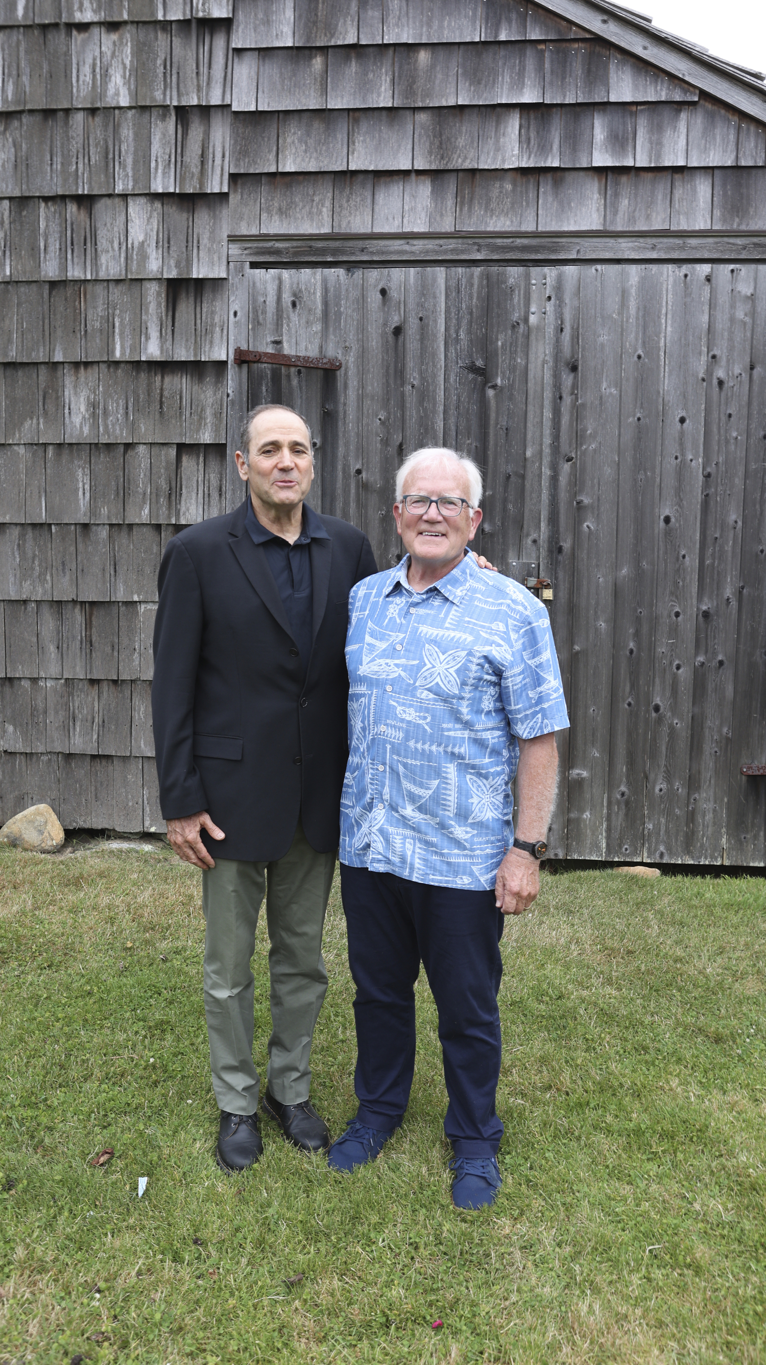 Twomey, Latham, Shea, Kelley, Dubin & Quartararo LLP senior partner David Dubin and Eleanor Whitmore Early Childhood Center executive director Timothy Frazier enjoying EWECC's annual summer benefit.