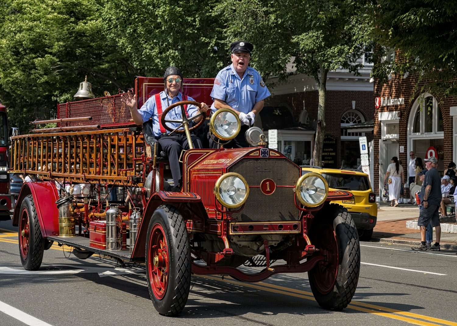 Southampton firemen Chris Olczak and David Raynor in the East Hampton Fire Department 125th anniversary parade on Saturday in East Hampton.  COURTESY OF THE WESTHAMPTON BEACH FIRE DEPARTMENT