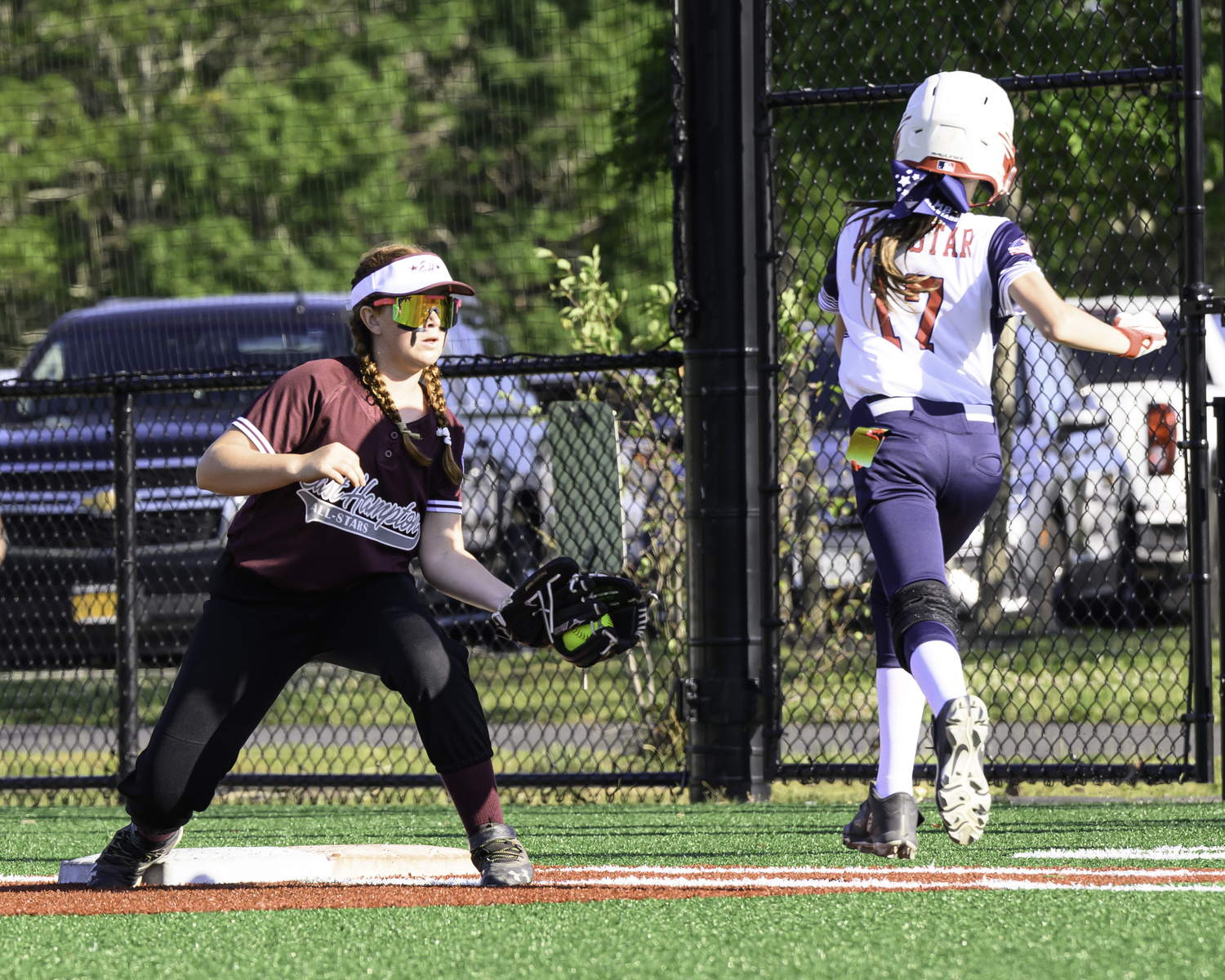 Siena Kinney catches a throw at first base. MARIANNE BARNETT