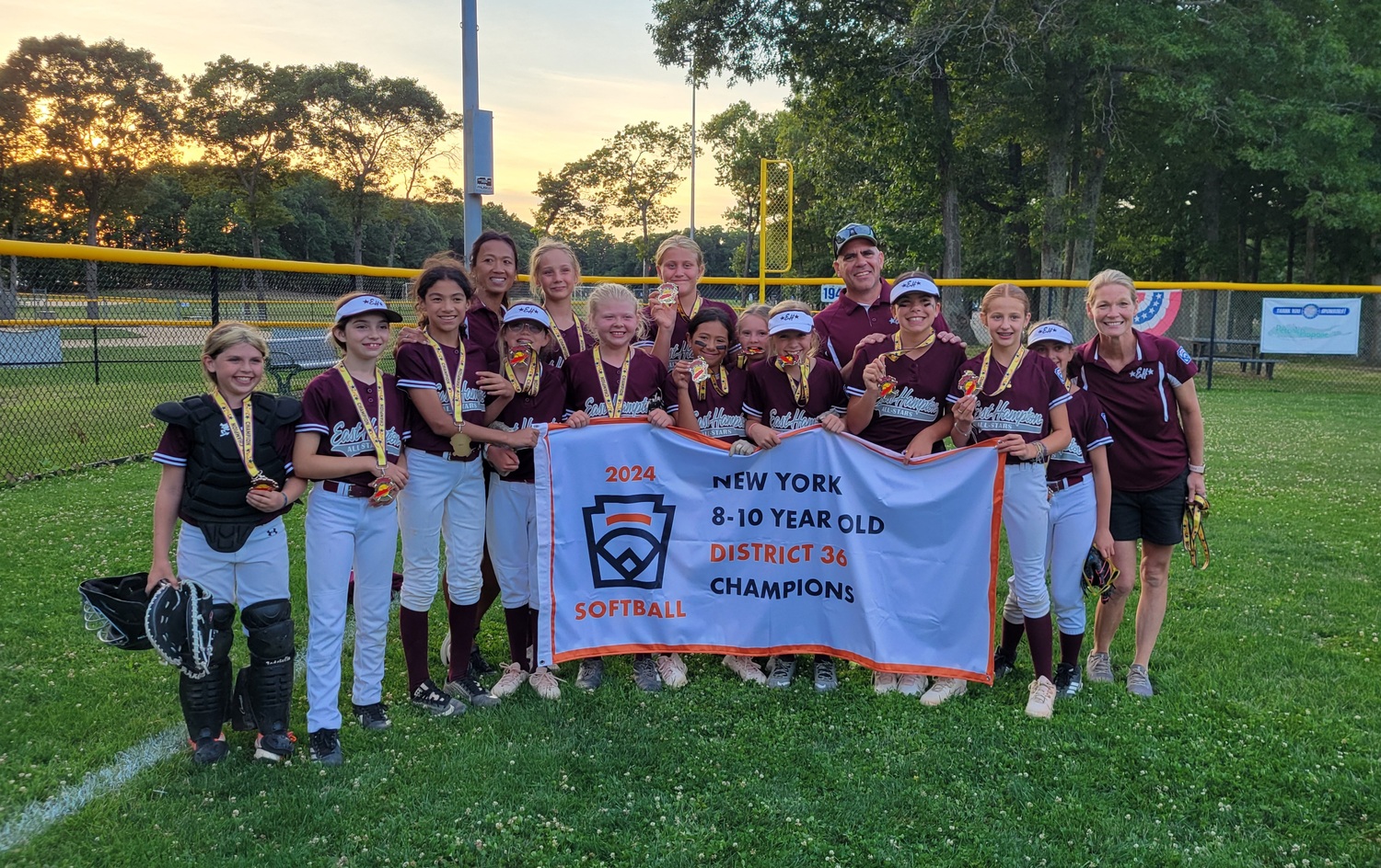 The East Hampton Little League 10-and-under softball All-Stars defeated Riverhead, 5-3, at Stotzky Park to win this year's District 36 Championship on Wednesday.  DREW BUDD