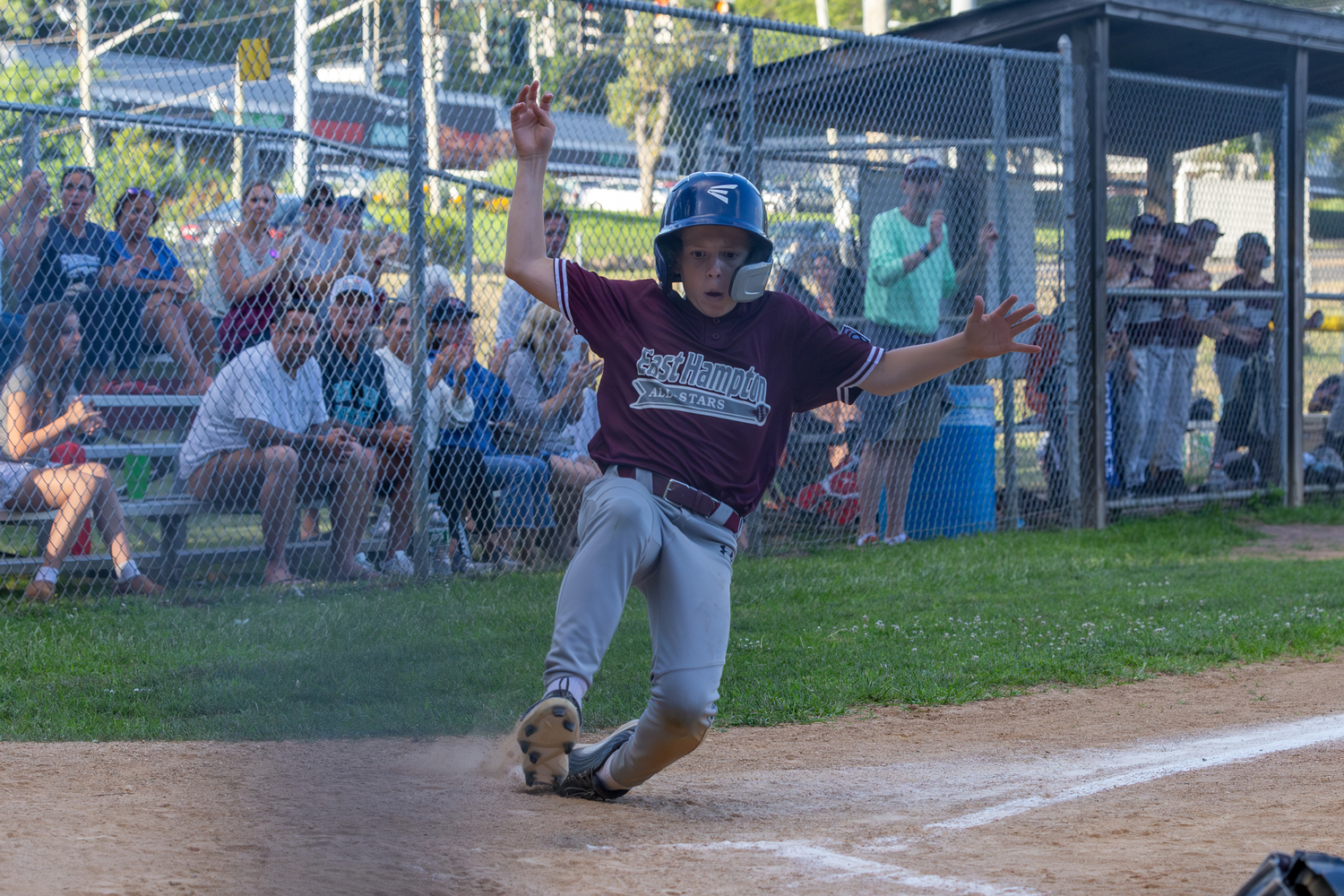 Owen Diamond scores a run.  RON ESPOSITO