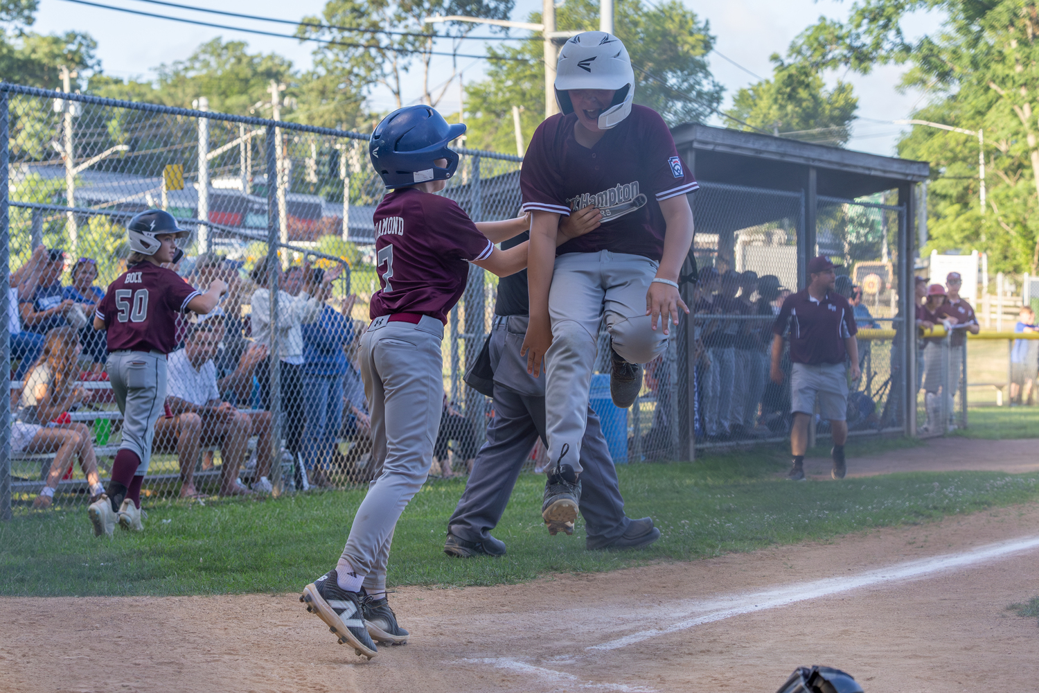 Scott Abran Jr. scores right after Owen Diamond to tie the game at 5-5 in the fourth inning.   RON ESPOSITO