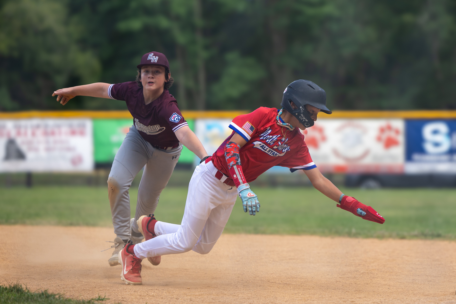 Jackson Cook tags out a North Shore baserunner for an unassisted double play.   RON ESPOSITO